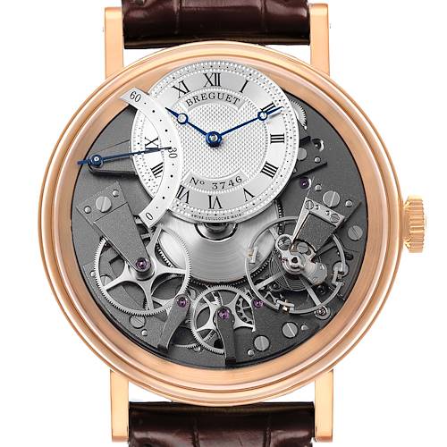 The Breguet Tradition G7097BR/G1/9WU Men's Rose Gold Silver Dial watch is shown from a front angle, highlighting its intricate gears and off-center dial.