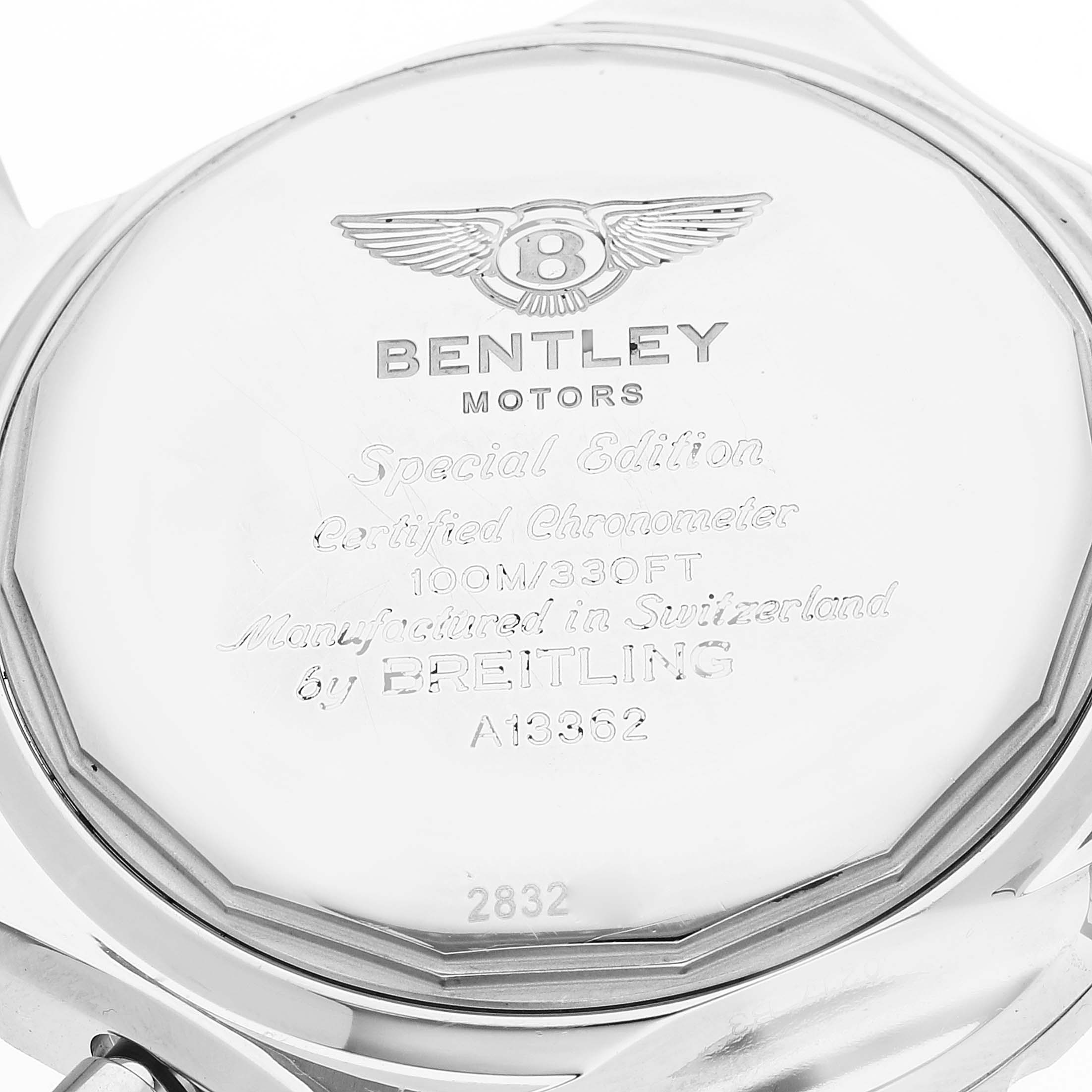 The image shows the back case of a Bentley Breitling watch, displaying the model details and brand inscriptions.