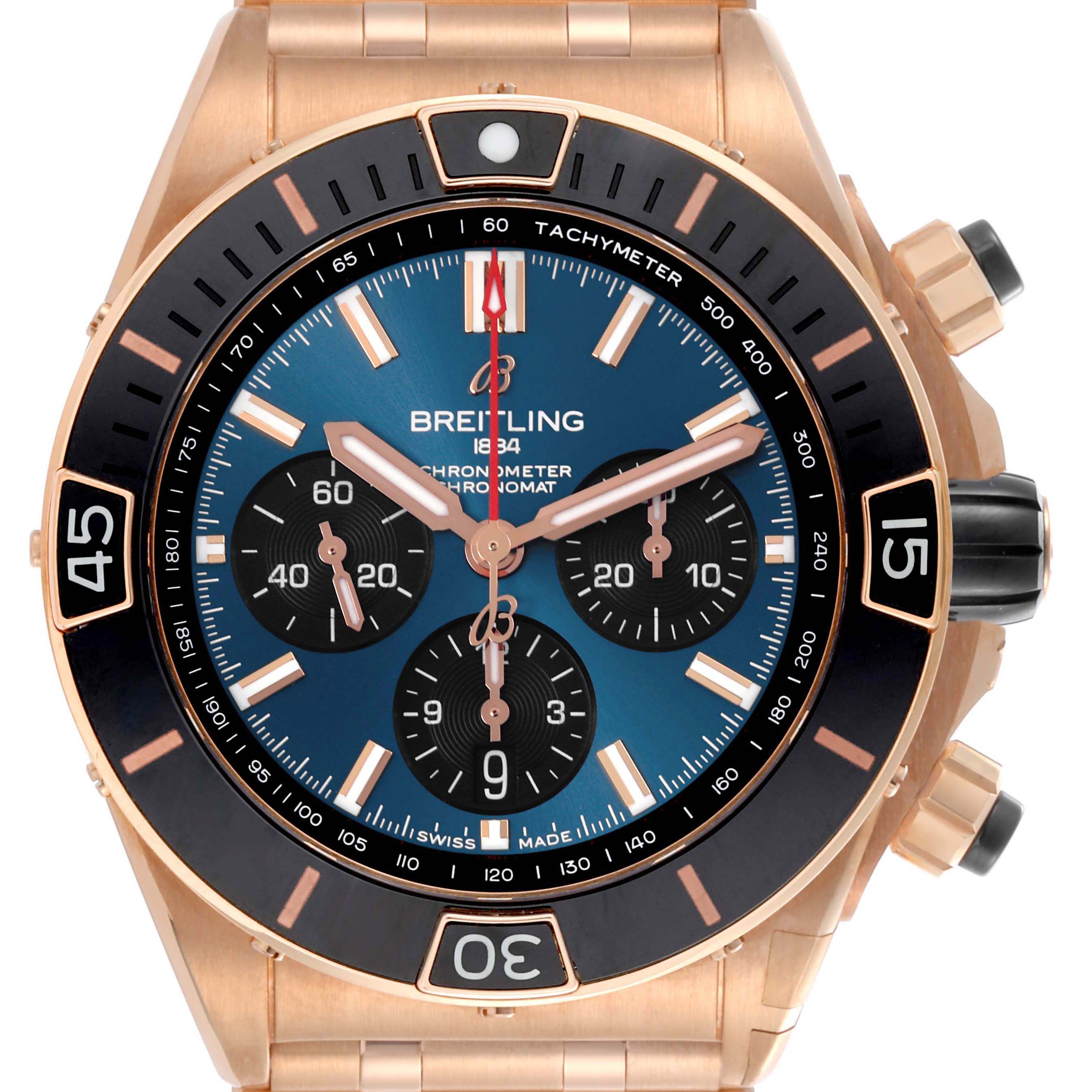 The Breitling Chronomat RB0136 Men's Rose Gold Blue Dial RB0136 Men's Rose Gold Blue Dial watch is shown from a front angle, displaying the dial, bezel, and part of the bracelet.
