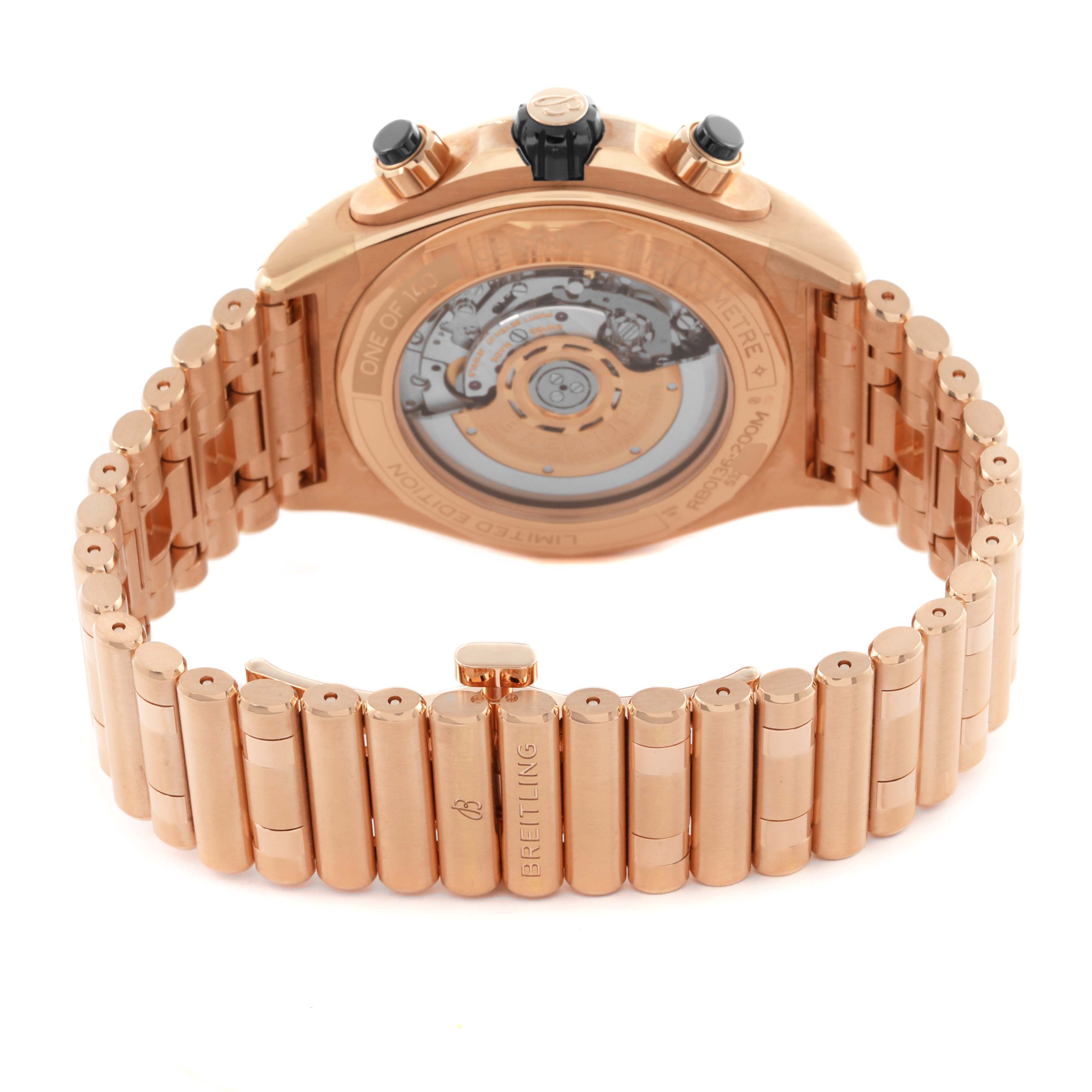 The Breitling Chronomat RB0136 Men's Rose Gold Blue Dial RB0136 Men's Rose Gold Blue Dial watch is shown from the back, highlighting the open case back and rose gold bracelet.