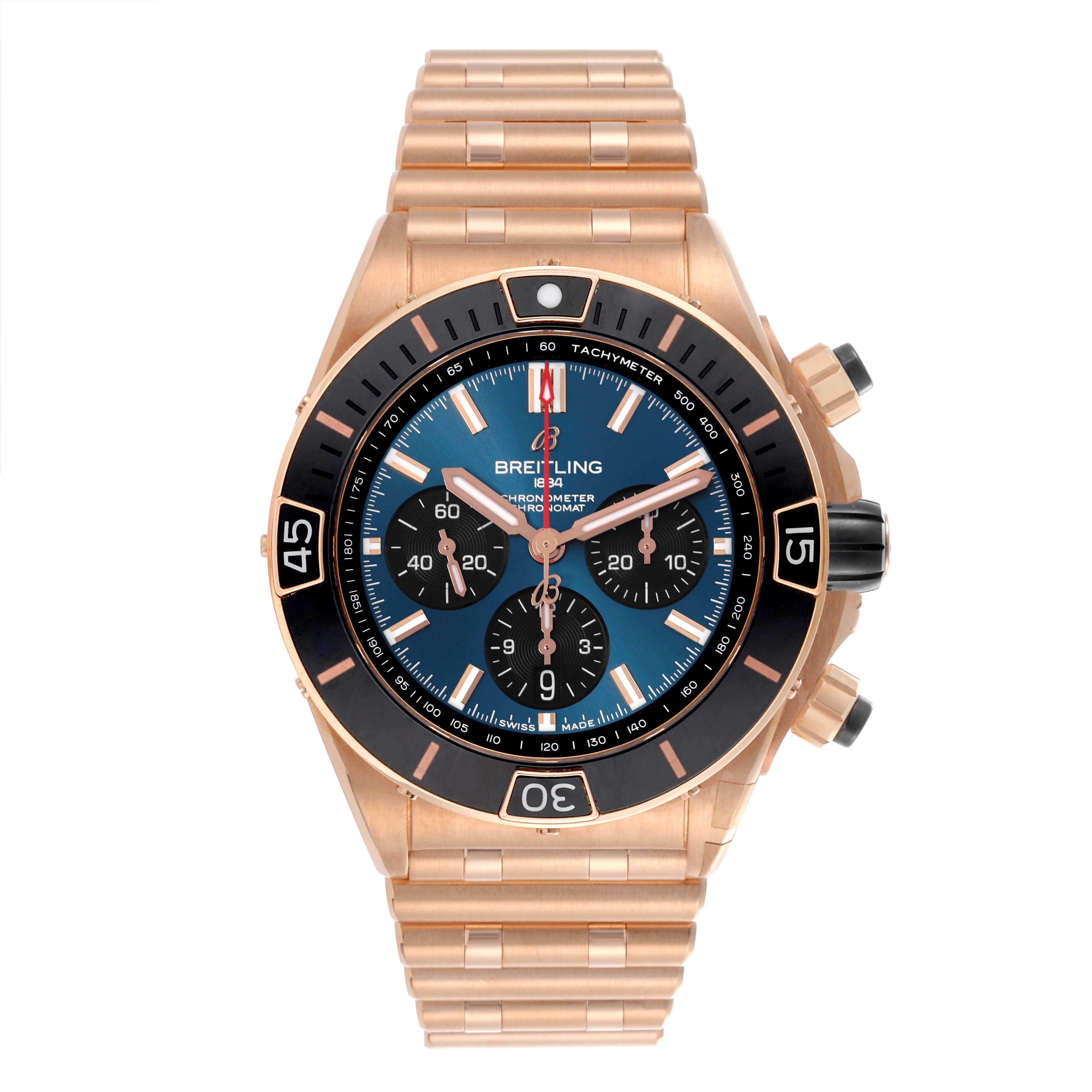 The Breitling Chronomat RB0136 Men's Rose Gold Blue Dial RB0136 Men's Rose Gold Blue Dial watch is shown from a top-down angle, displaying its face, bezel, and bracelet.