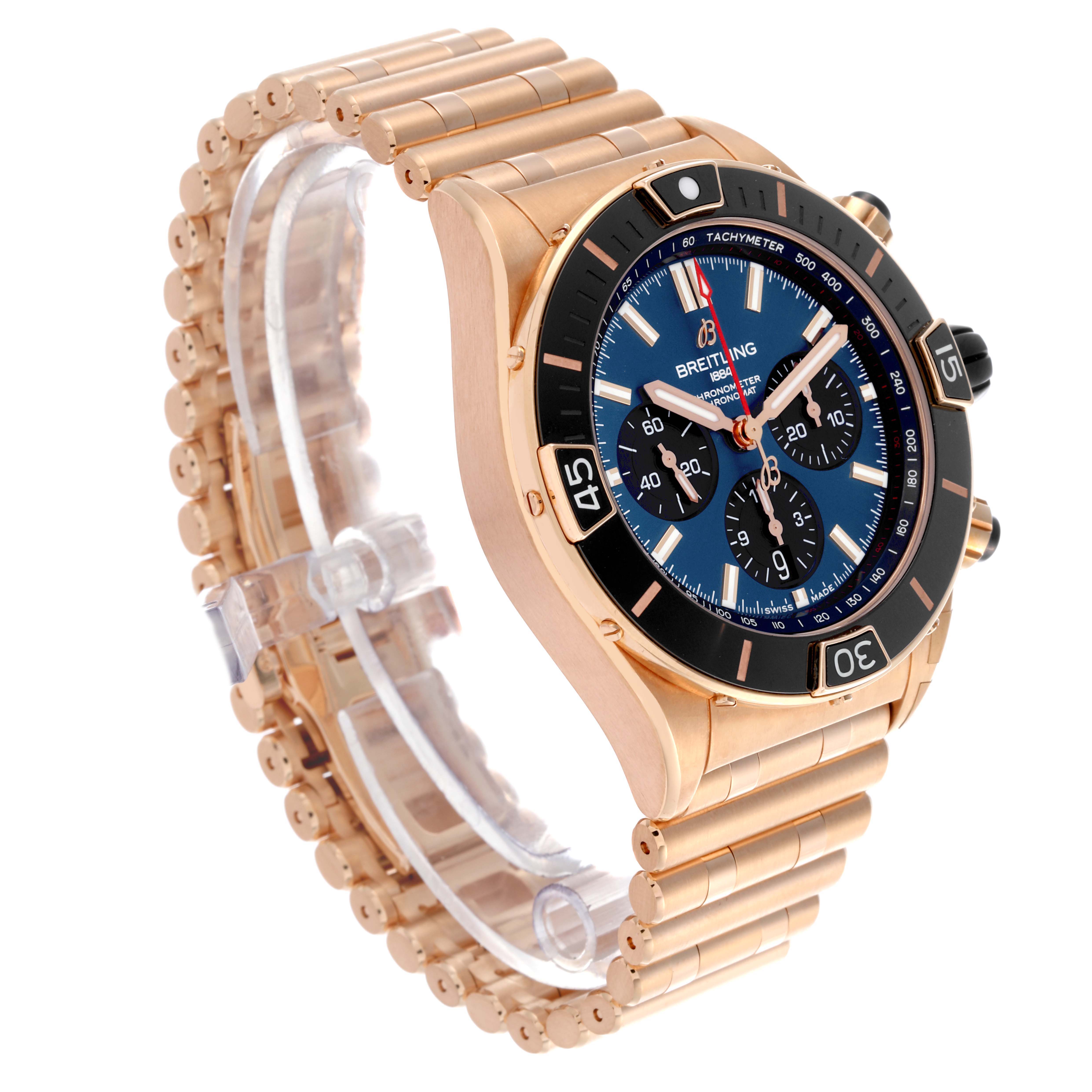 The Breitling Chronomat RB0136 Men's Rose Gold Blue Dial RB0136 Men's Rose Gold Blue Dial watch is shown at a three-quarter angle, highlighting the face, bezel, and bracelet.