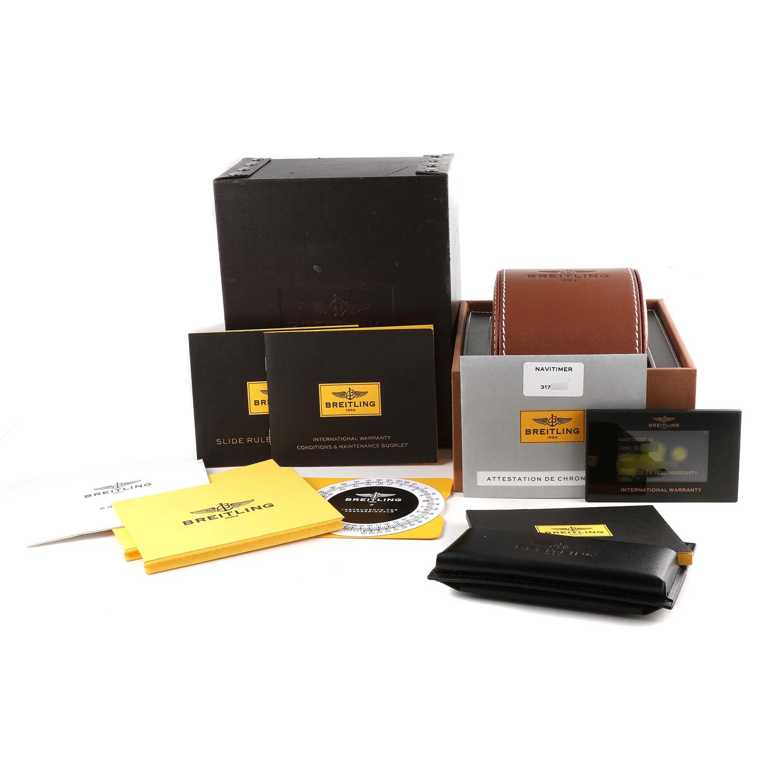 The image shows a Breitling Navitimer AB0120 Men
s Stainless Steel Black Dial AB0120 Men
s Stainless Steel Black Dial watch set with its box, warranty card, instructions, and various accessories.