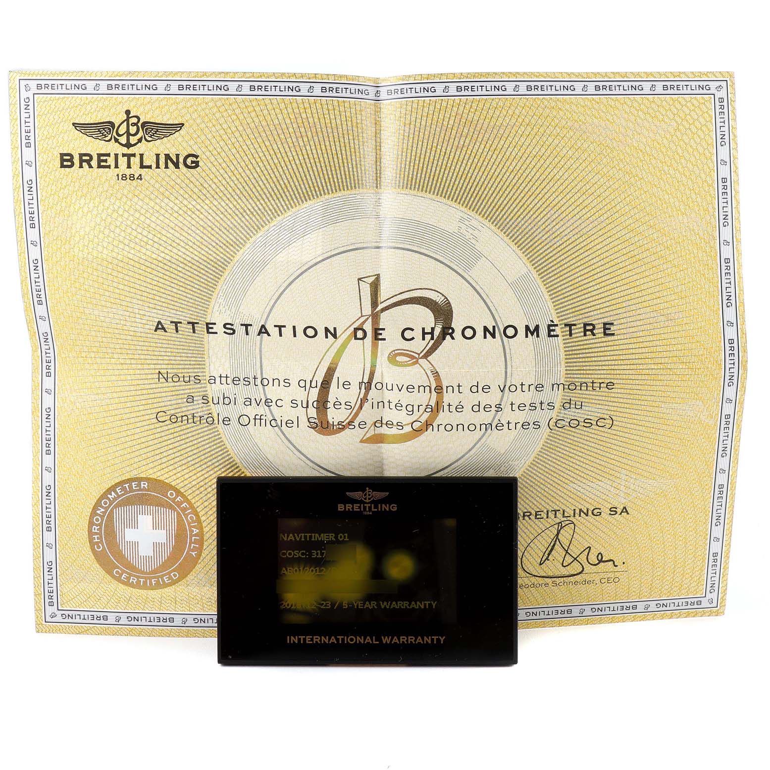 The image shows the official attestations and warranty card for the Breitling Navitimer AB0120 Men
s Stainless Steel Black Dial AB0120 Men
s Stainless Steel Black Dial model watch.