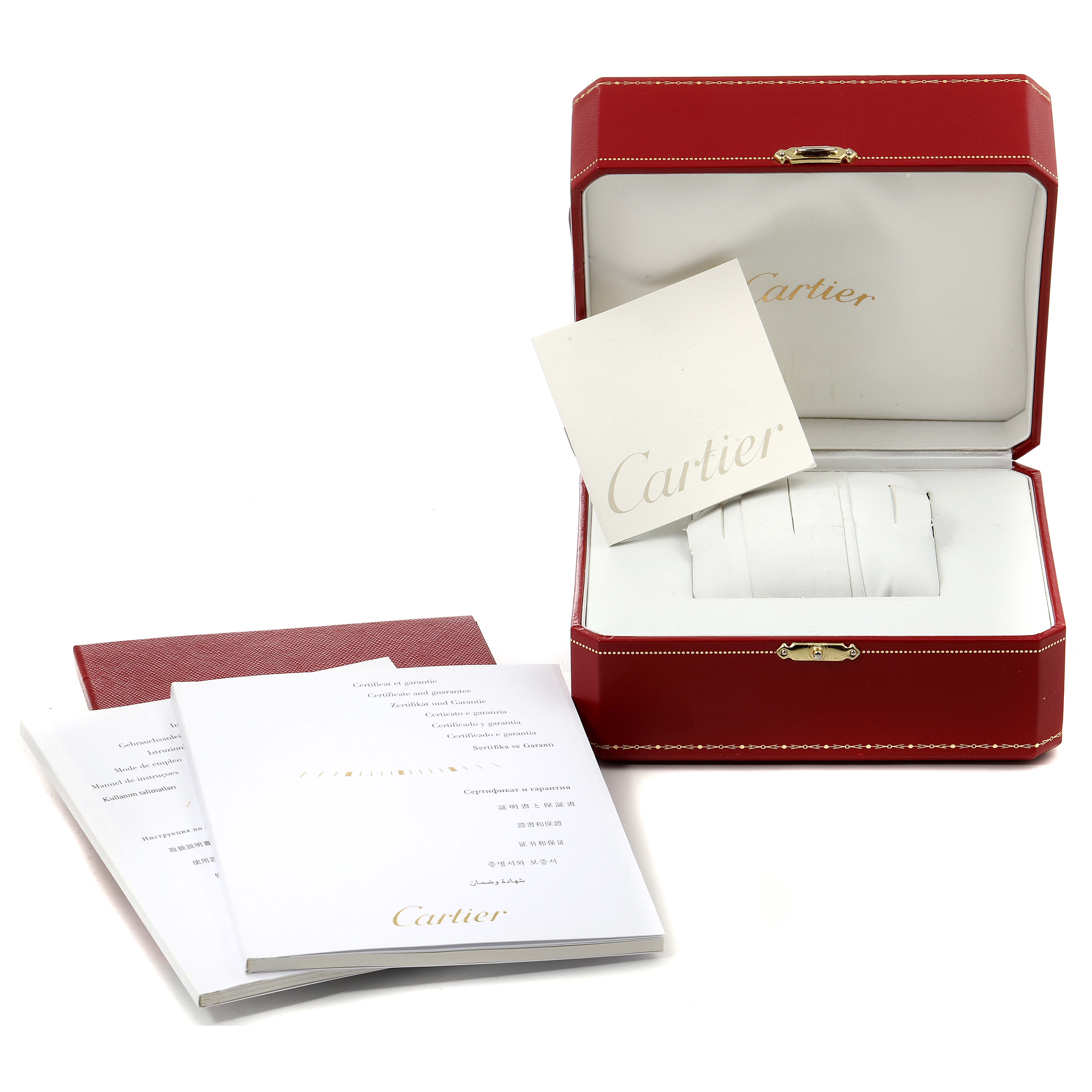 This image shows the Cartier Pasha W31074M7 Men's Stainless Steel White Dial W31074M7 Men's Stainless Steel White Dial watch packaging, including a red box, a white cushion, and accompanying booklets.
