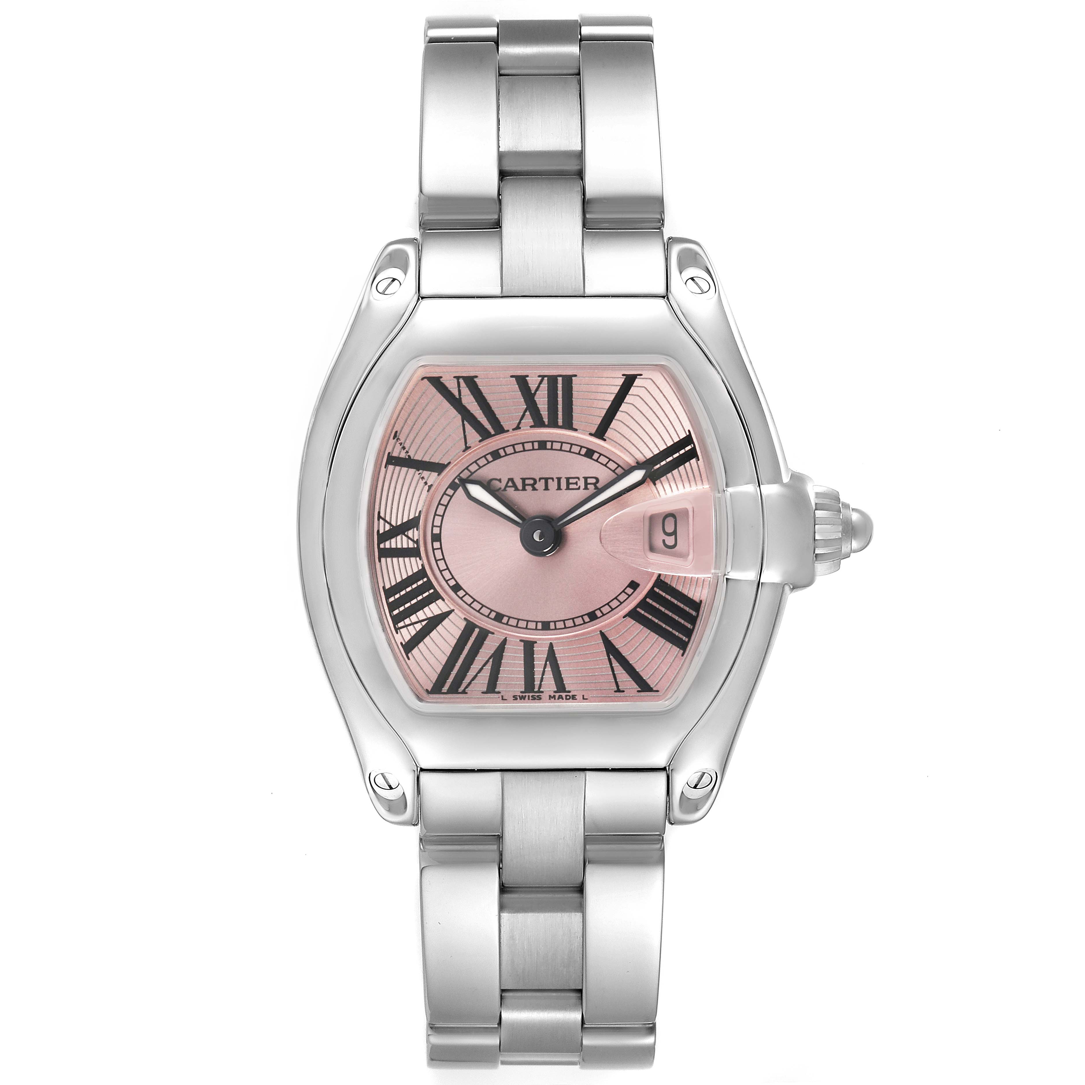 The Cartier Roadster W62017V3 Women's Stainless Steel Pink Dial watch is shown from a top-down angle, revealing the face, bracelet, and date window.