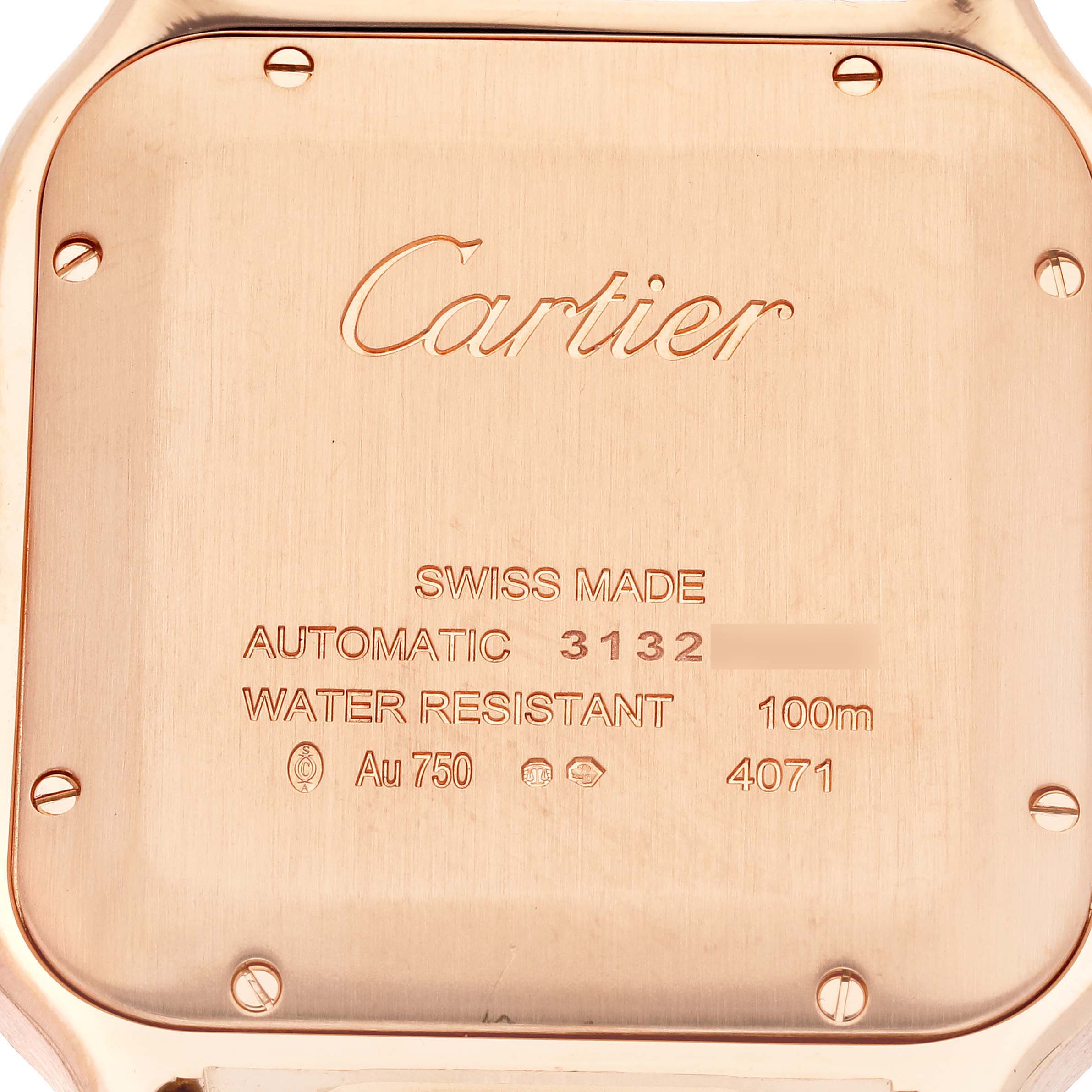 The image shows the case back of a Cartier Santos WGSA0019 Men
s Rose Gold Silver Dial WGSA0019 Men
s Rose Gold Silver Dial watch, highlighting its engravings and screws.