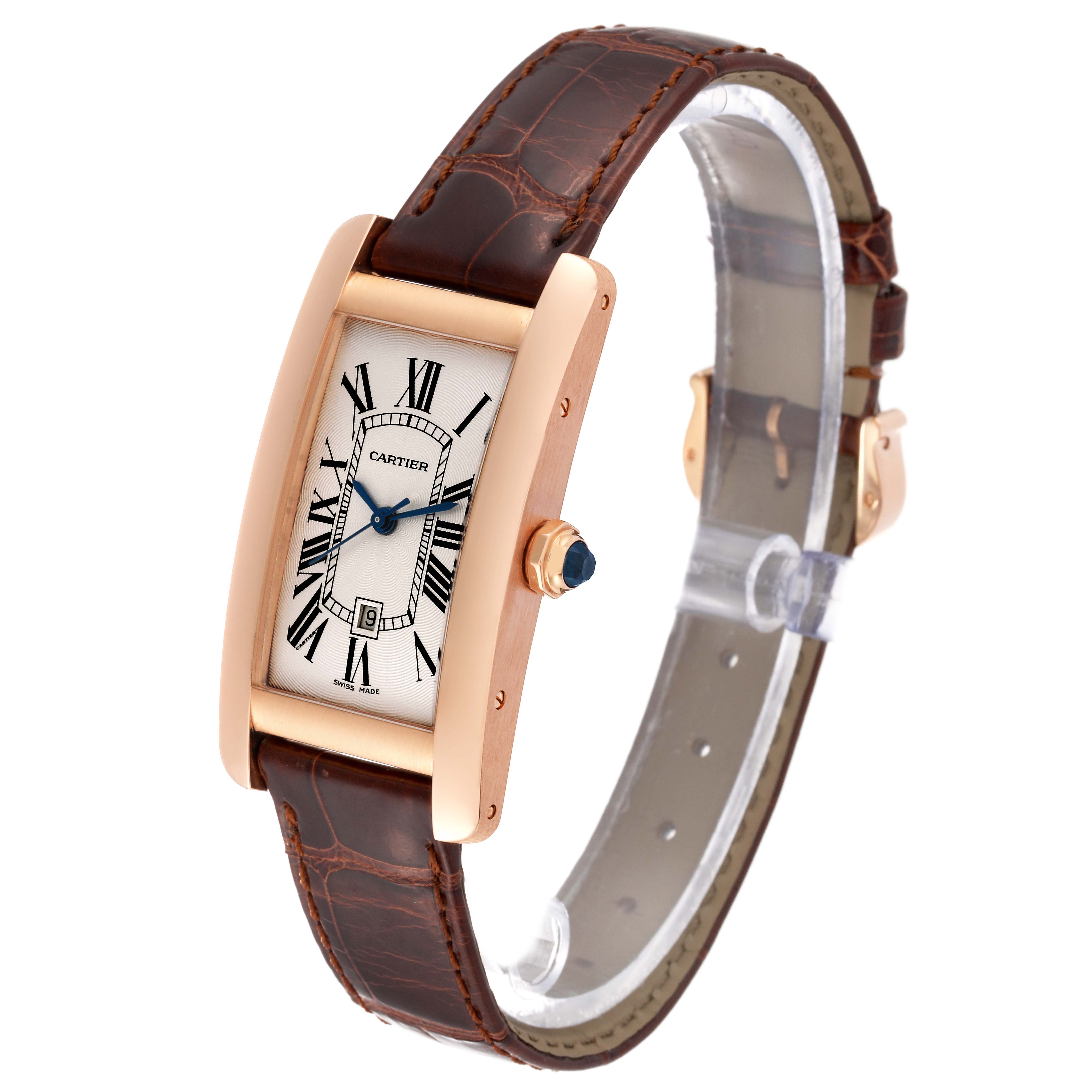 The image shows a side angle view of the Cartier Tank Américaine watch, highlighting its elongated case, brown leather strap, and crown.