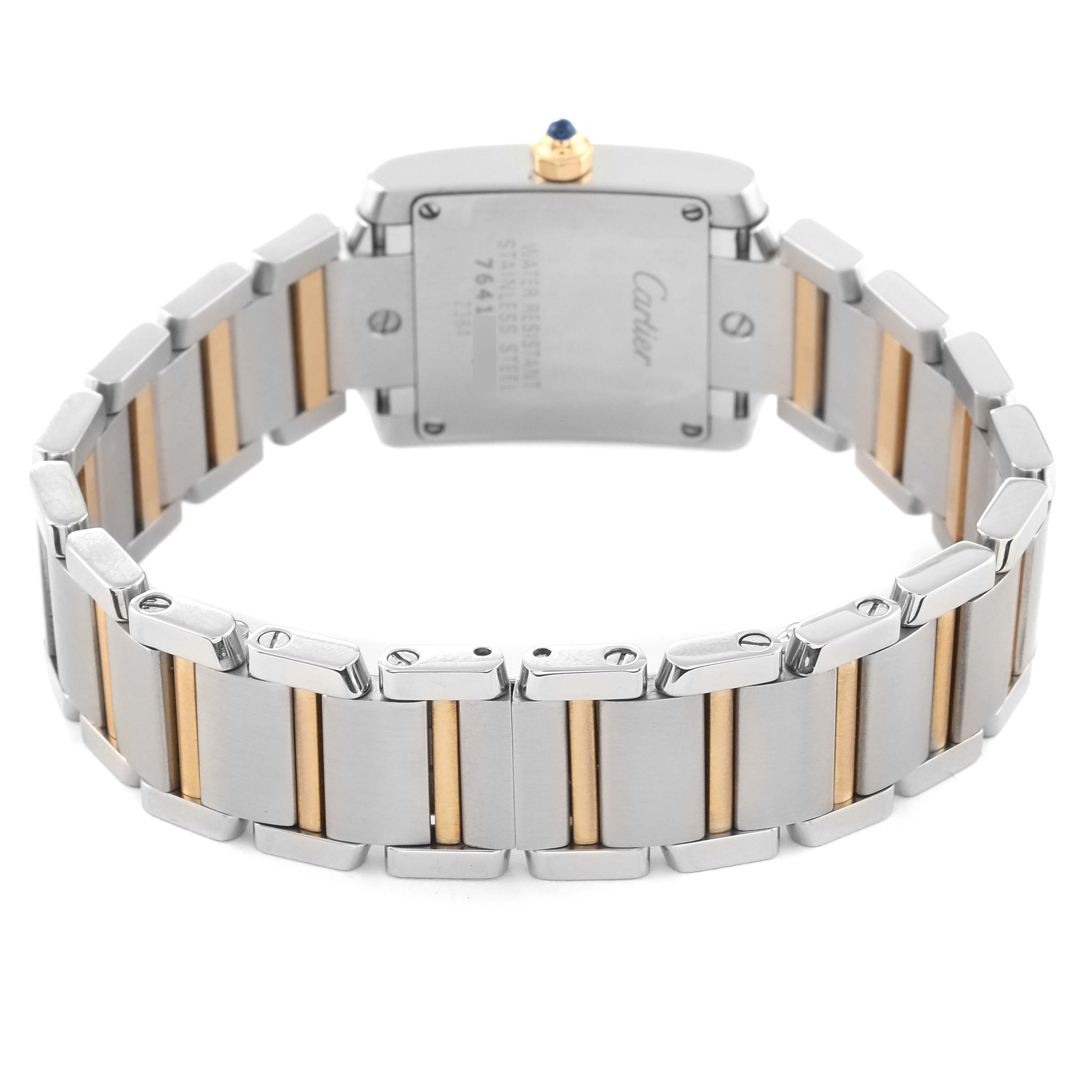 The image shows the back view of a Cartier Tank Francaise W51007Q4 Women
s Steel and Gold (two tone) Silver Dial W51007Q4 Women
s Steel and Gold (two tone) Silver Dial watch, focusing on its stainless steel and gold bracelet and case back.