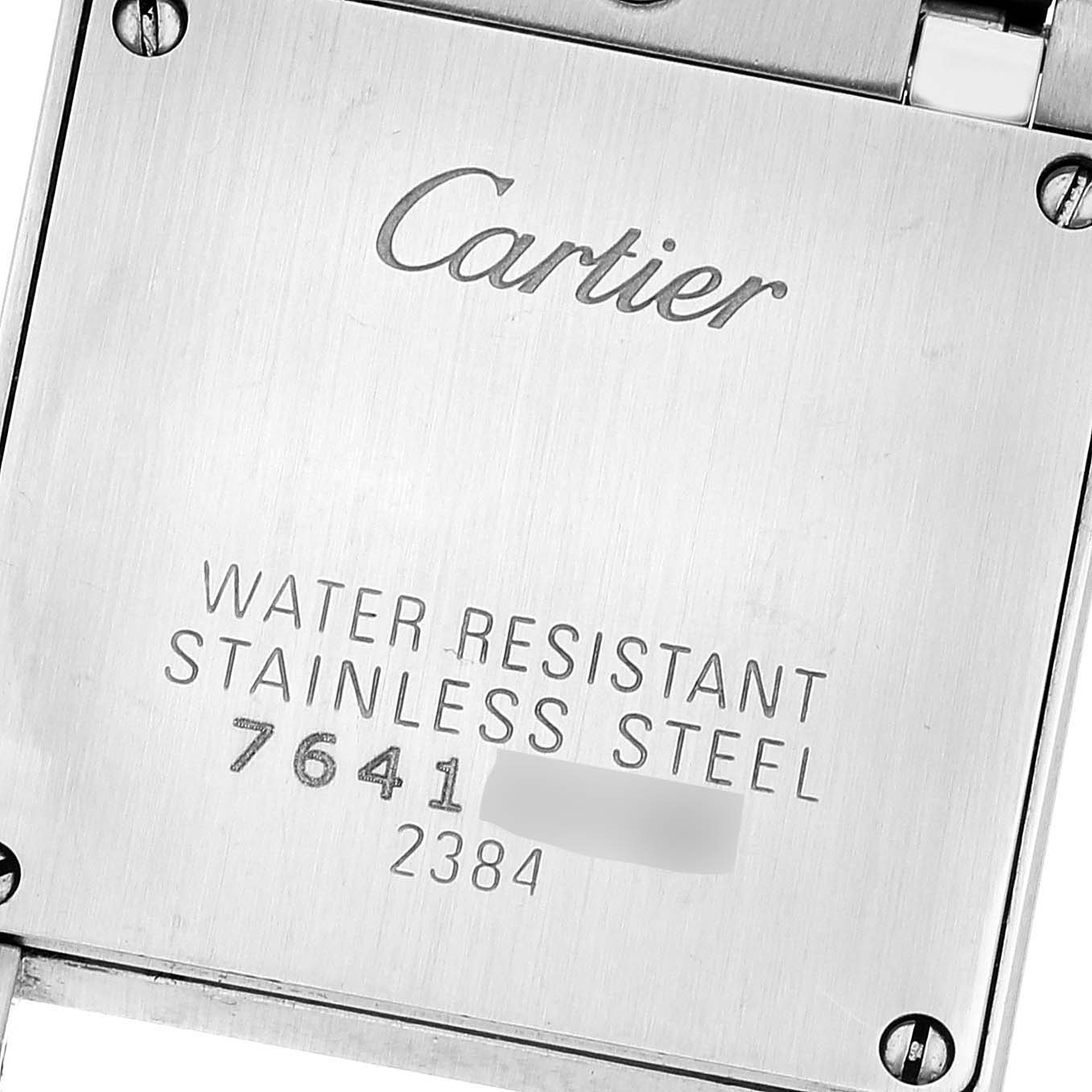 This image shows the back case of a Tank Francaise model by Cartier, highlighting the brand
s engraving and water resistance details.