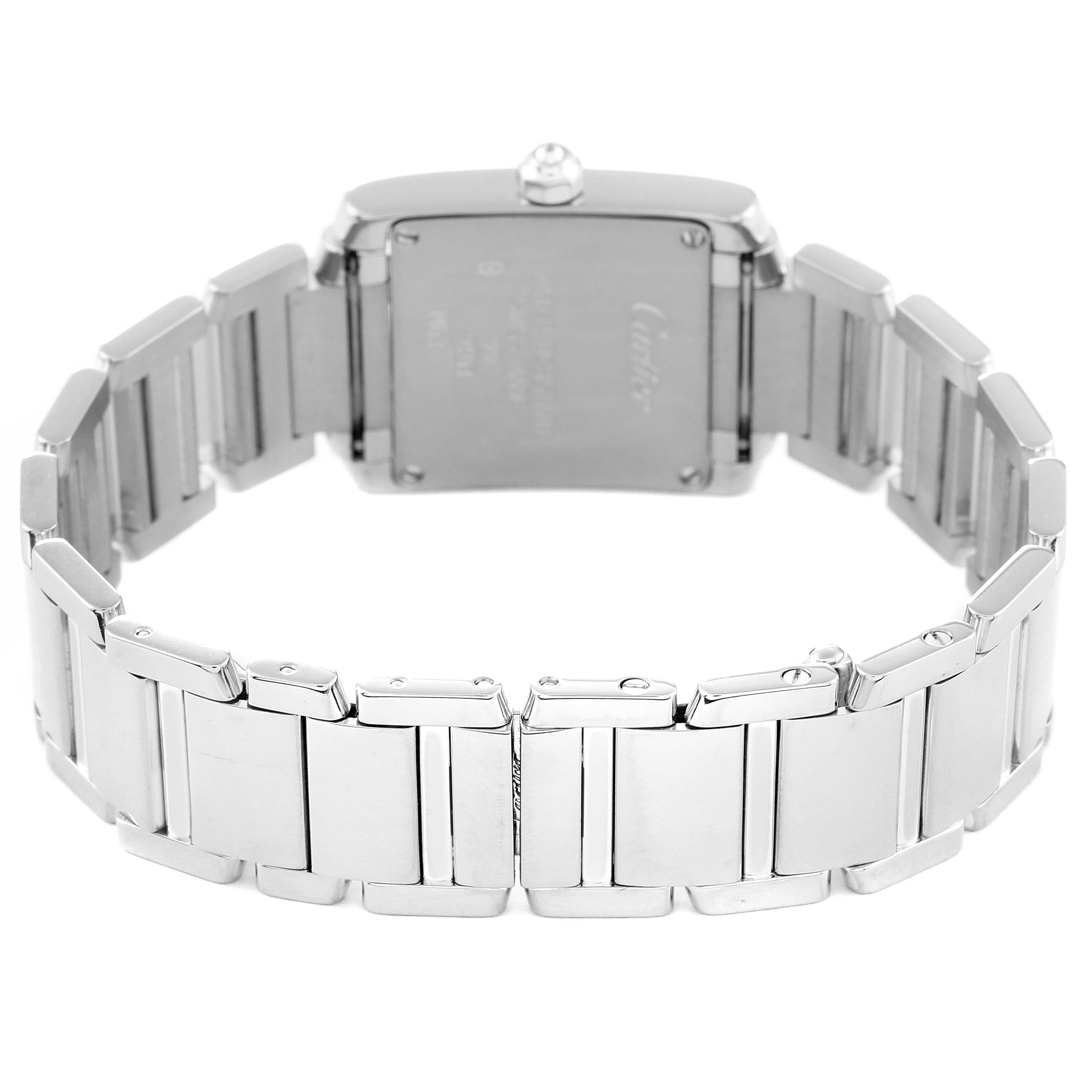 The image shows the rear view of the Cartier Tank Francaise WE1002S3 Women
s White Gold Silver Dial WE1002S3 Women
s White Gold Silver Dial watch, highlighting its metal bracelet and case back.