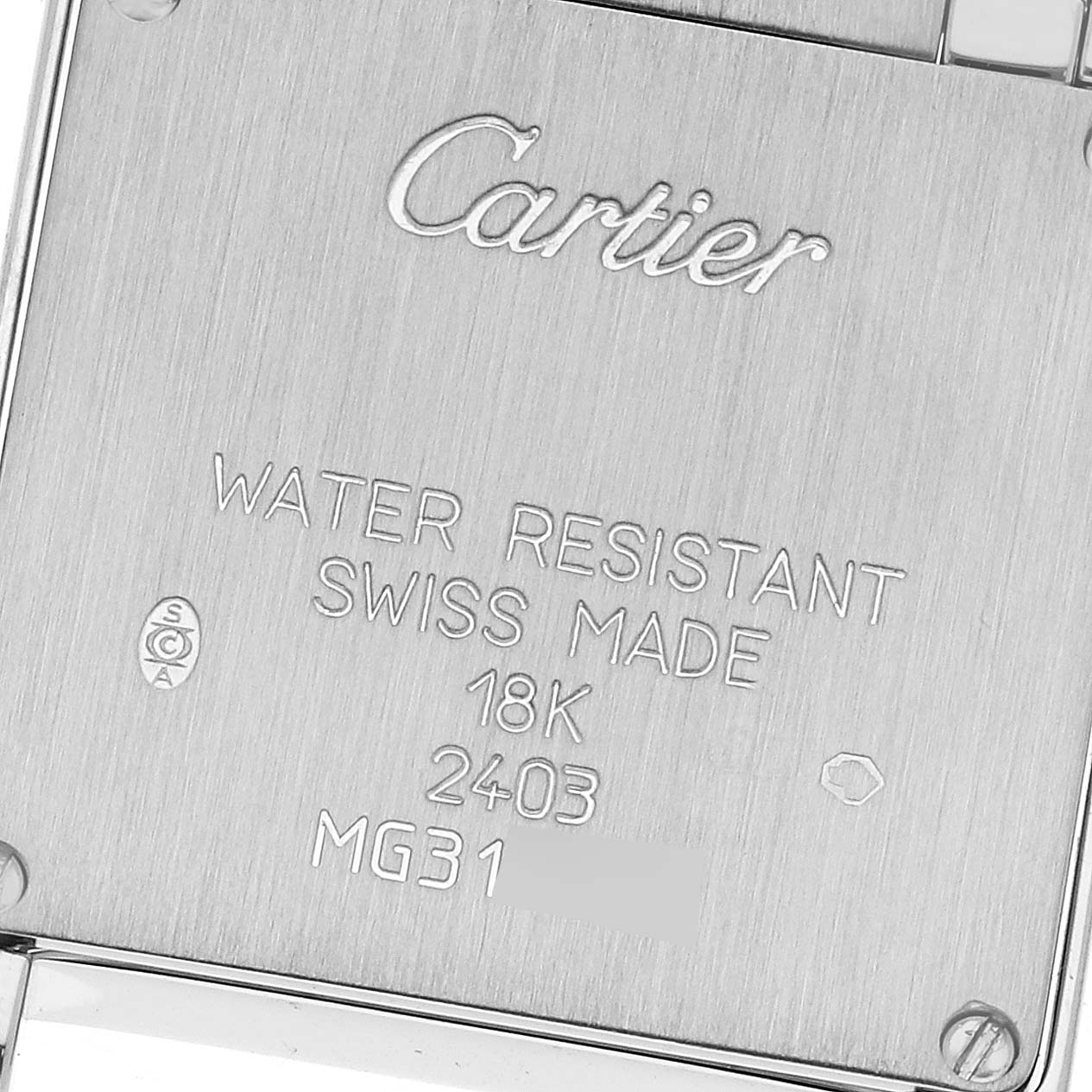This image shows the back case of a Cartier Tank Francaise WE1002S3 Women
s White Gold Silver Dial WE1002S3 Women
s White Gold Silver Dial watch, displaying engravings about its specifications.