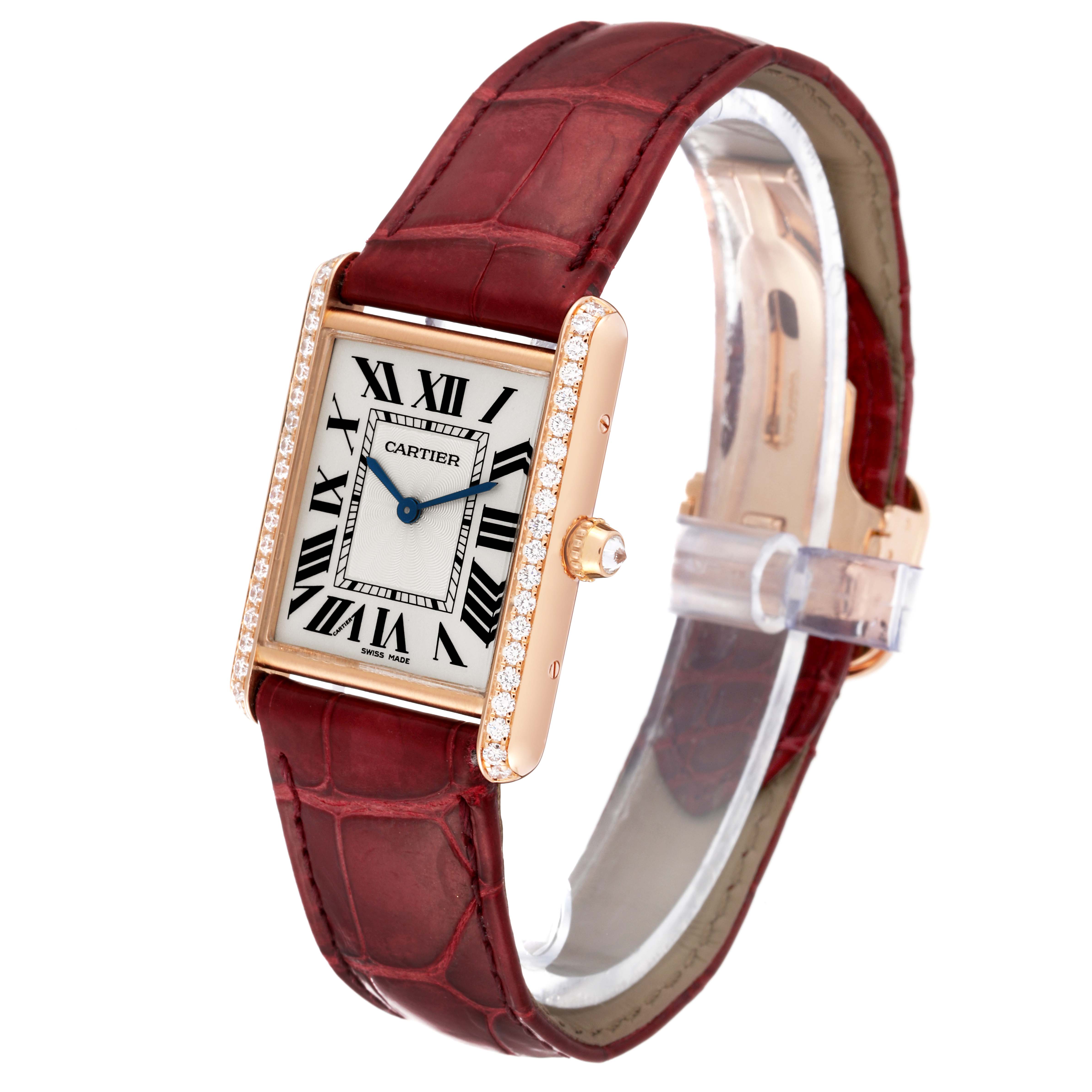 The Cartier Tank Louis WJTA0014 Women's Rose Gold Silver Dial WJTA0014 Women's Rose Gold Silver Dial watch is angled slightly to the right, showcasing its face, bezel, crown, and leather strap.