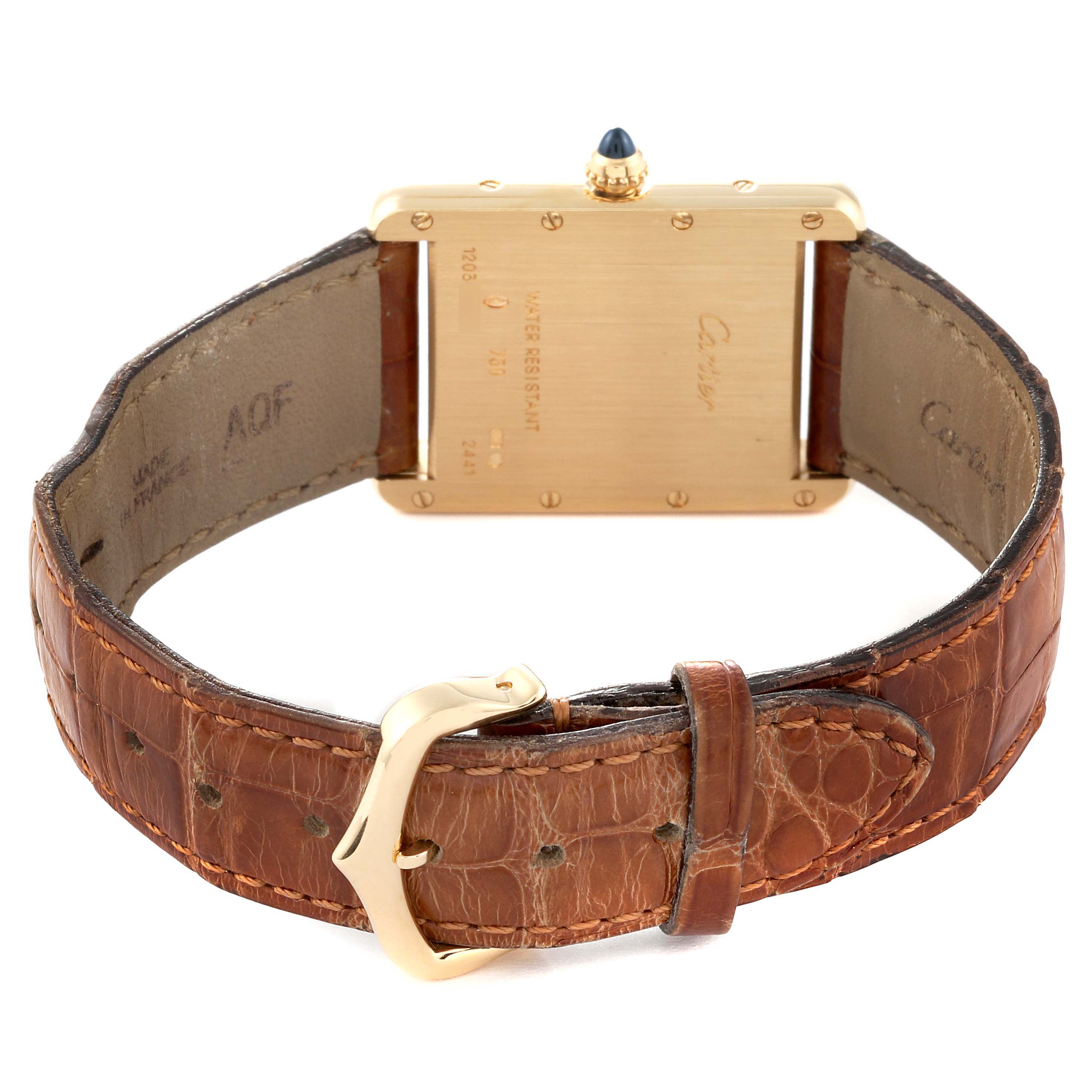 This image shows the back view of the Cartier Tank Louis W1529756 Men's Yellow Gold Silver Dial W1529756 Men's Yellow Gold Silver Dial watch, highlighting the leather strap and gold buckle.