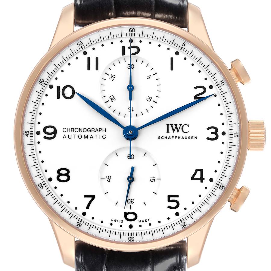 The IWC Portuguese watch is shown from a front angle, highlighting its dial, hands, subdials, crown, and leather strap.