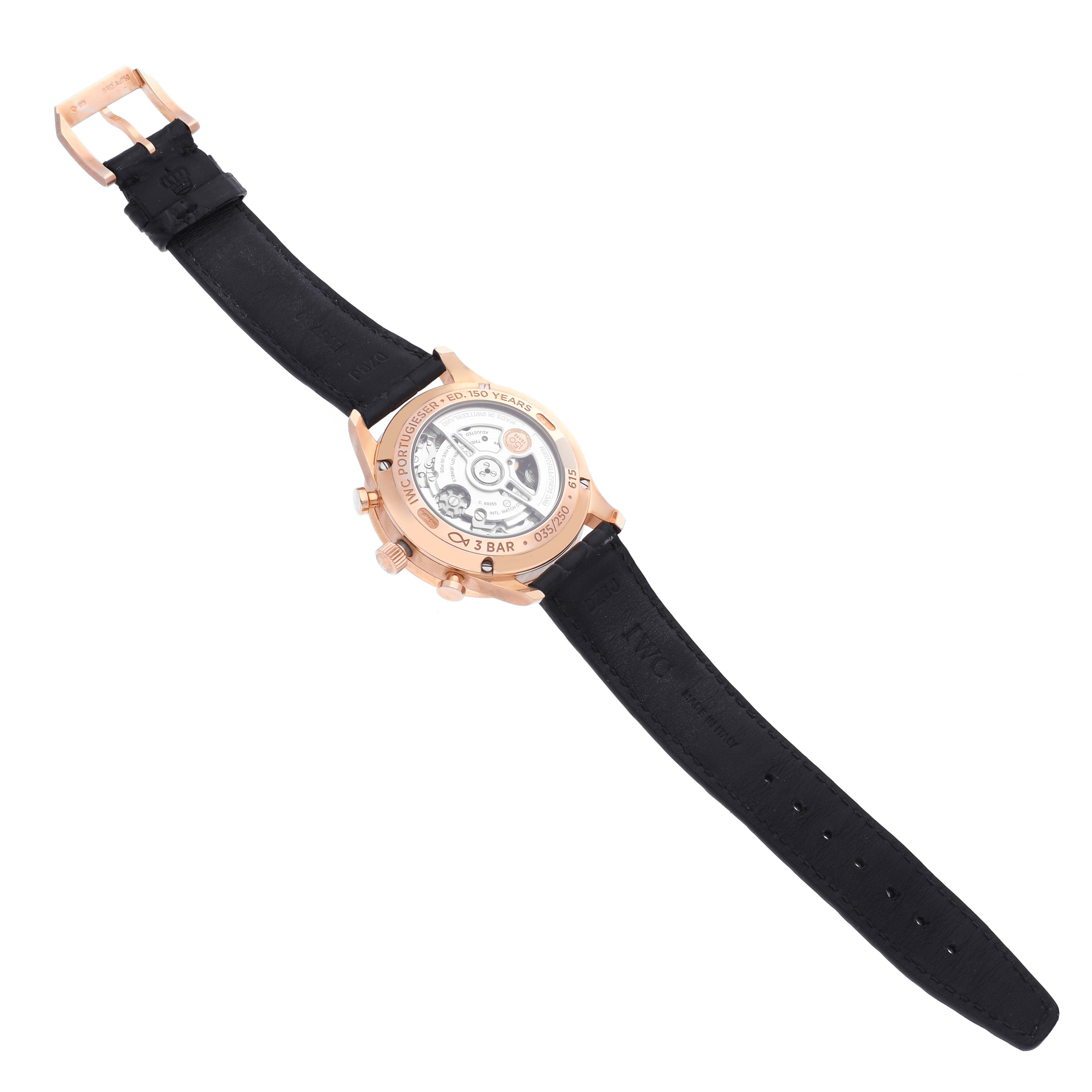 The IWC Portuguese IW371603 Men's Rose Gold White Dial IW371603 Men's Rose Gold White Dial watch is shown from the back, displaying the movement and strap.