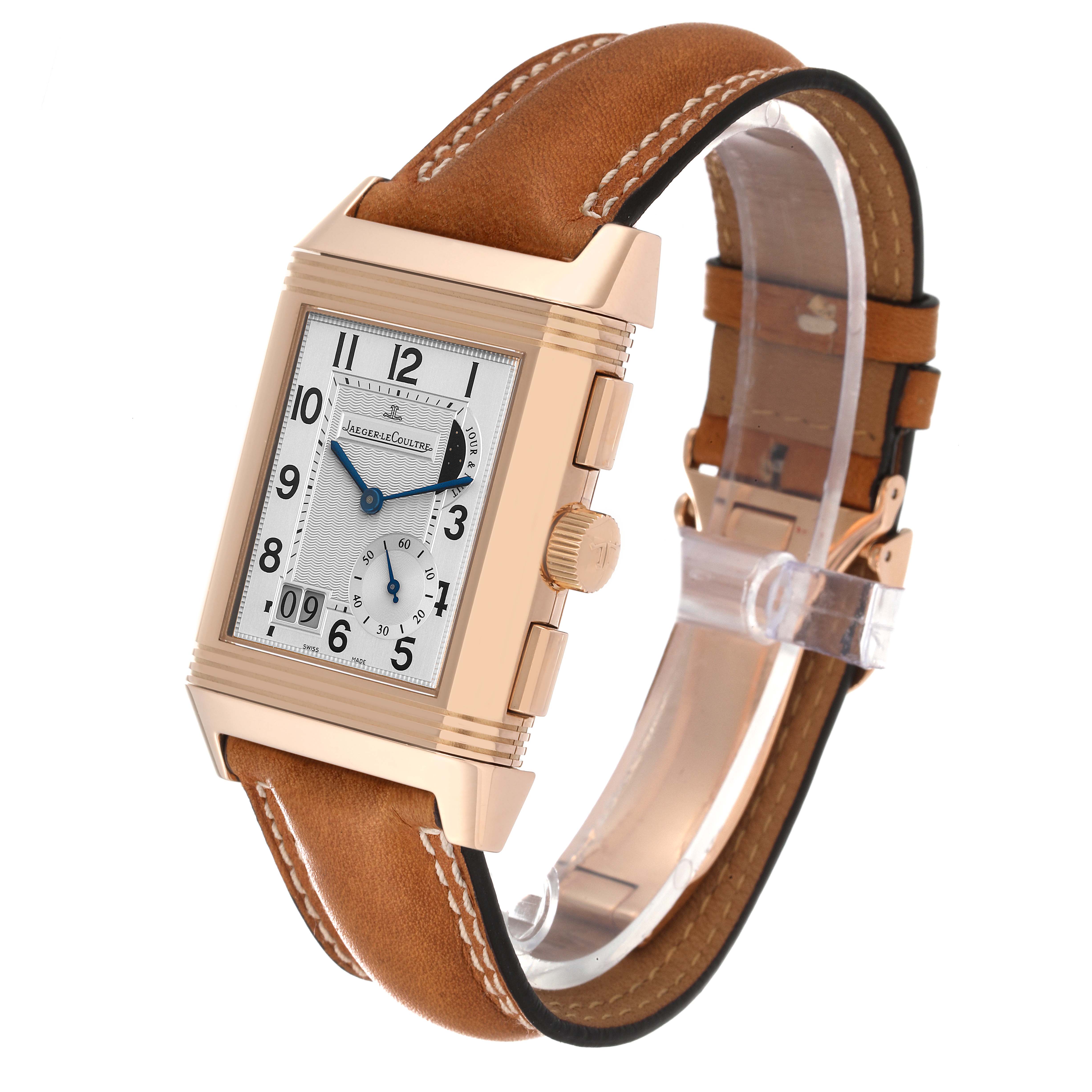 The image shows a Jaeger LeCoultre Reverso Q3022420 Men's Rose Gold Silver Dial Q3022420 Men's Rose Gold Silver Dial watch at an angle highlighting the front dial, case, crown, and brown leather strap.