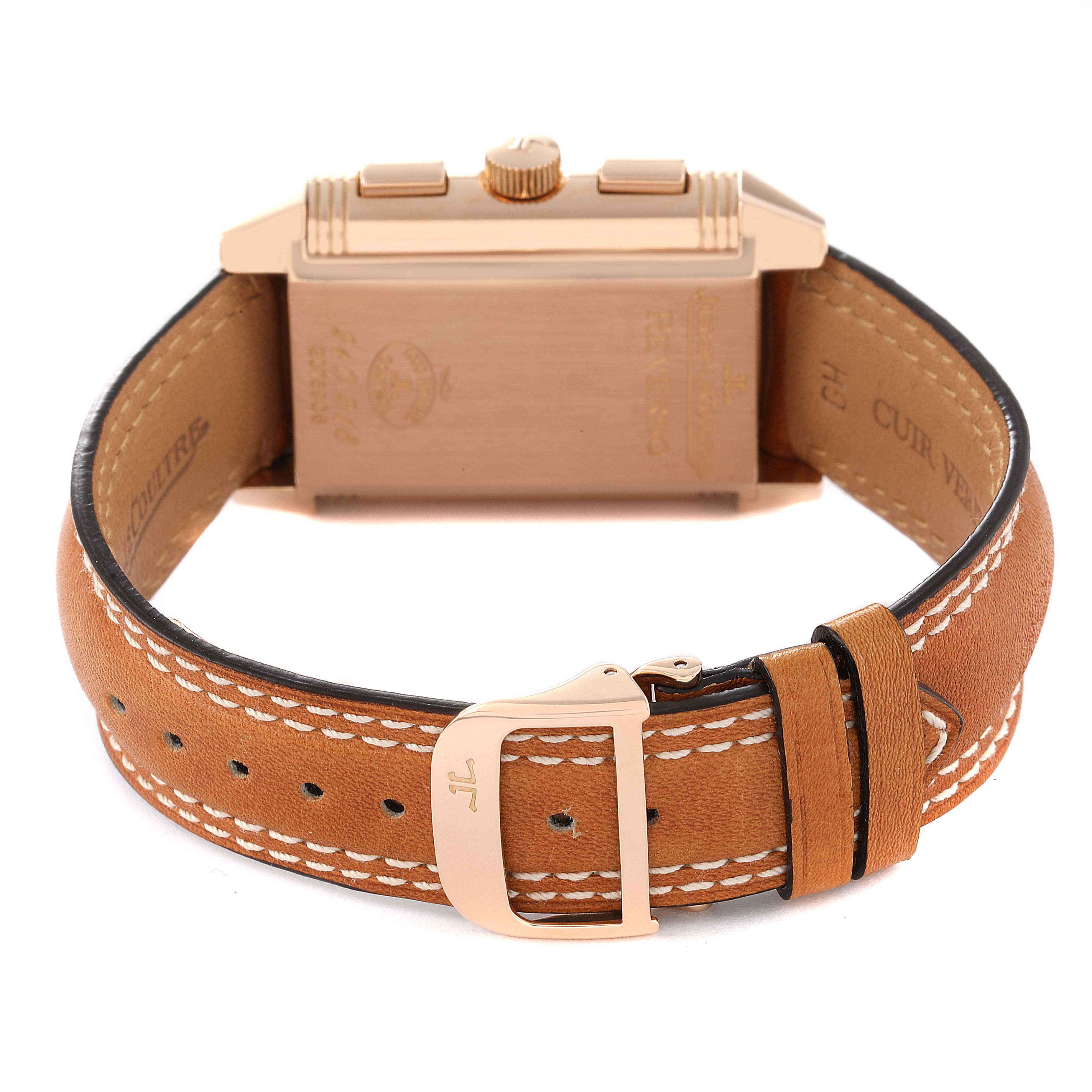 This image shows the back view of a Jaeger LeCoultre Reverso Q3022420 Men's Rose Gold Silver Dial Q3022420 Men's Rose Gold Silver Dial watch focusing on the tan leather strap and the watch case.
