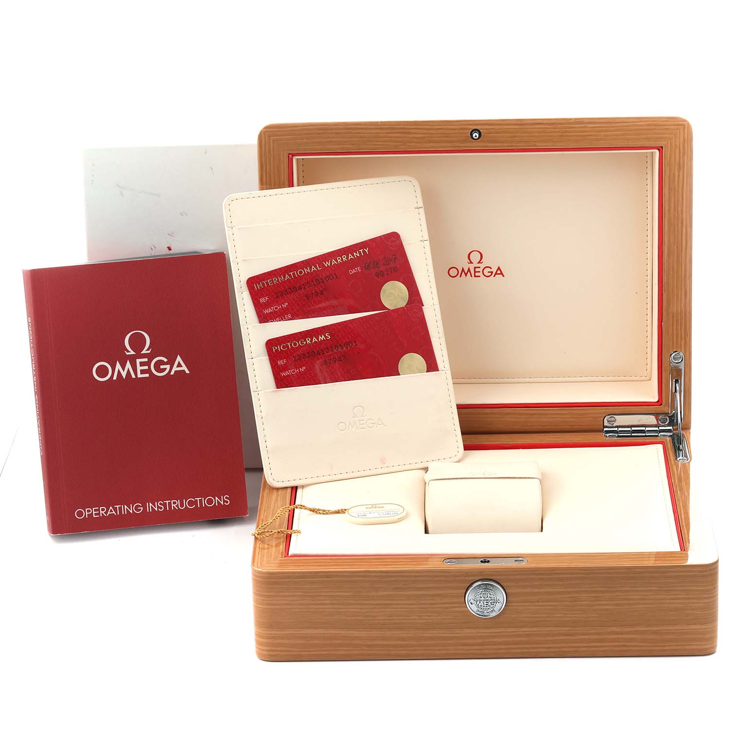 The image shows an Omega Seamaster 233.30.41.21.01.001 Men
s Stainless Steel Black Dial 233.30.41.21.01.001 Men
s Stainless Steel Black Dial watch box, warranty cards, and an instruction booklet from a front angle.