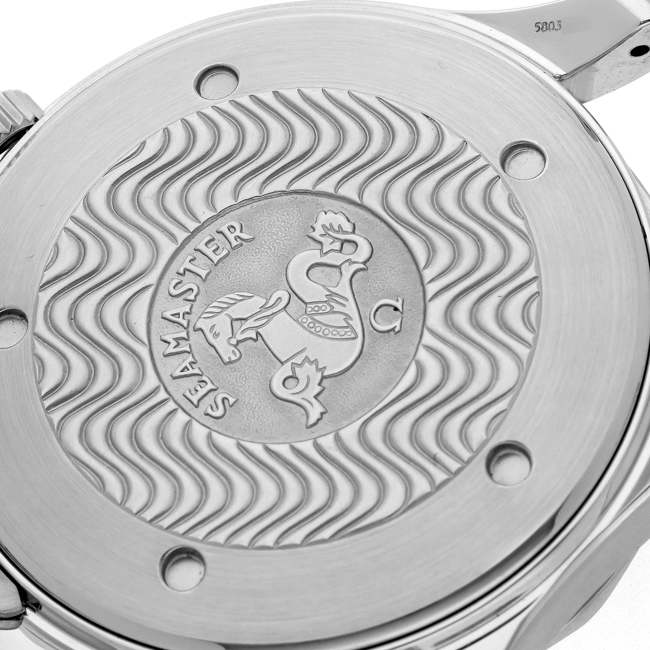 The image shows the back casing of an Omega Seamaster 2264.50.00 Men
s Stainless Steel Black Dial 2264.50.00 Men
s Stainless Steel Black Dial watch with its signature embossed medallion design.