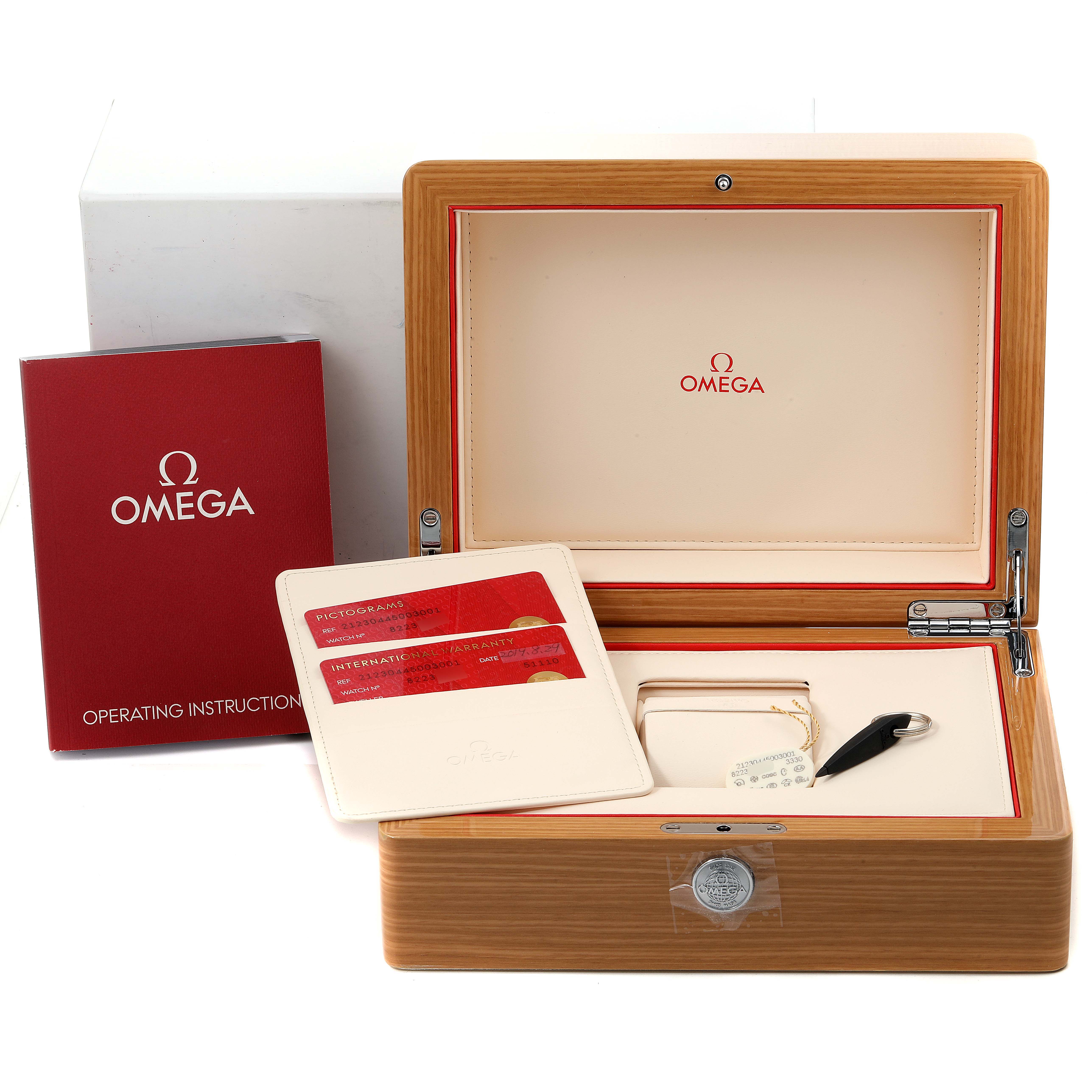 The image shows an Omega Seamaster 212.30.44.50.03.001 Men's Stainless Steel Blue Dial 212.30.44.50.03.001 Men's Stainless Steel Blue Dial watch box, operating instructions, warranty card, and accessories at a front angle.