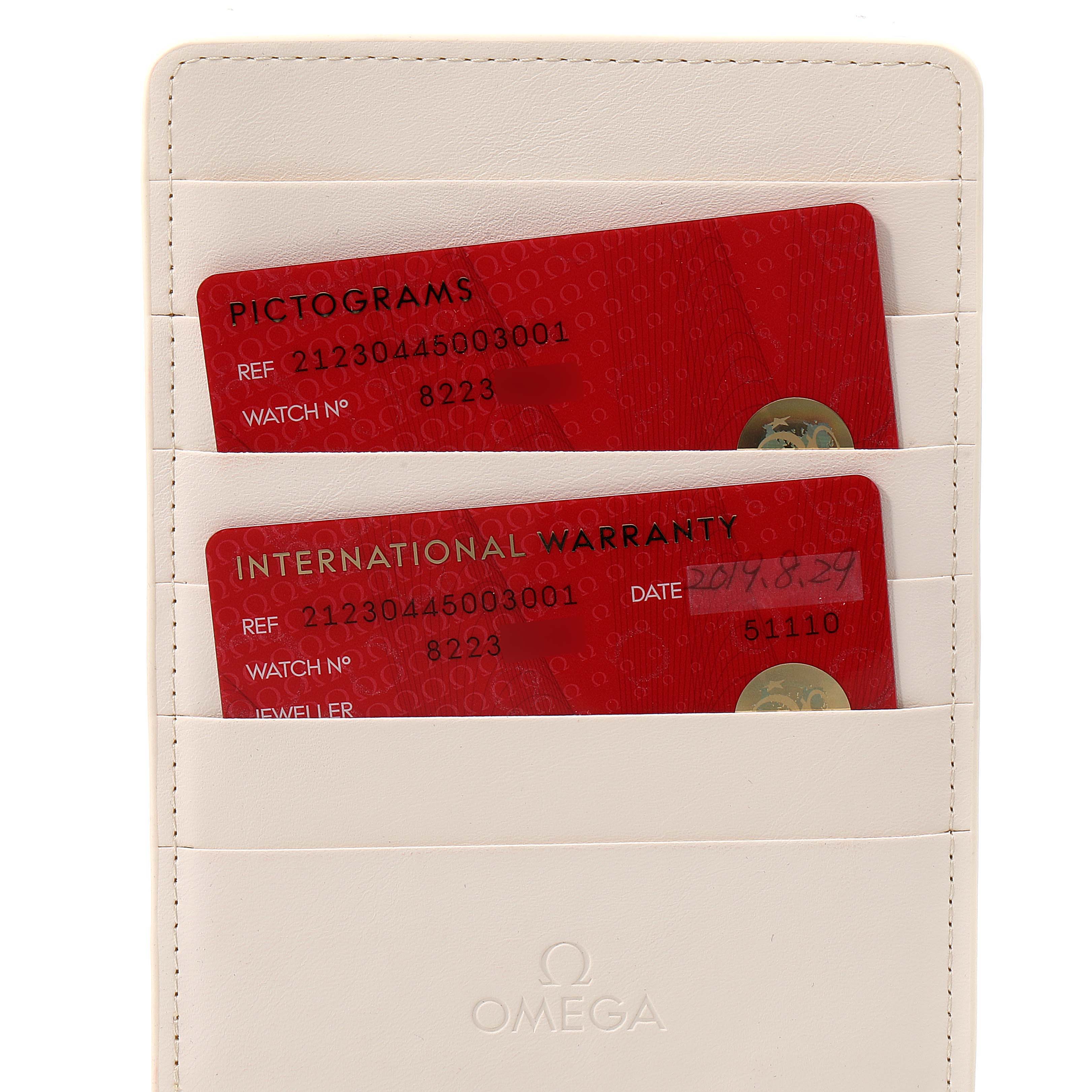 The image shows Omega Seamaster 212.30.44.50.03.001 Men's Stainless Steel Blue Dial 212.30.44.50.03.001 Men's Stainless Steel Blue Dial model warranty cards and pictogram cards in a white cardholder.