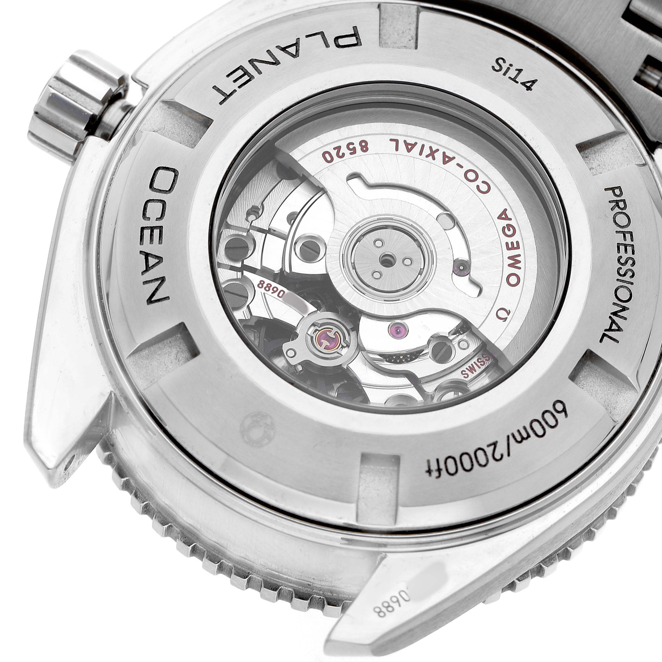 The image shows the back of an Omega Planet Ocean 232.30.38.20.01.002 Men's Stainless Steel Black Dial watch, highlighting its movement through the transparent case back.