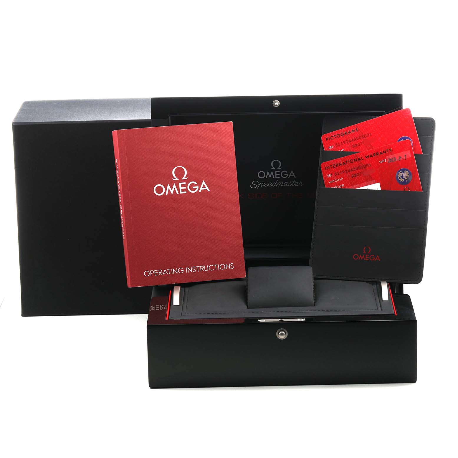 The Omega Speedmaster 311.92.44.30.01.001 Men's Ceramic Black Dial package includes a watch box, operating instructions, and warranty cards, shown from a frontal angle.