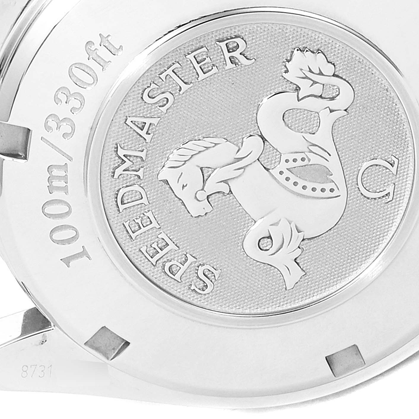 The image shows the case back of an Omega Speedmaster 323.30.40.40.06.001 Men's Stainless Steel Grey Dial 323.30.40.40.06.001 Men's Stainless Steel Grey Dial watch, highlighting the model name, depth rating, and emblem.