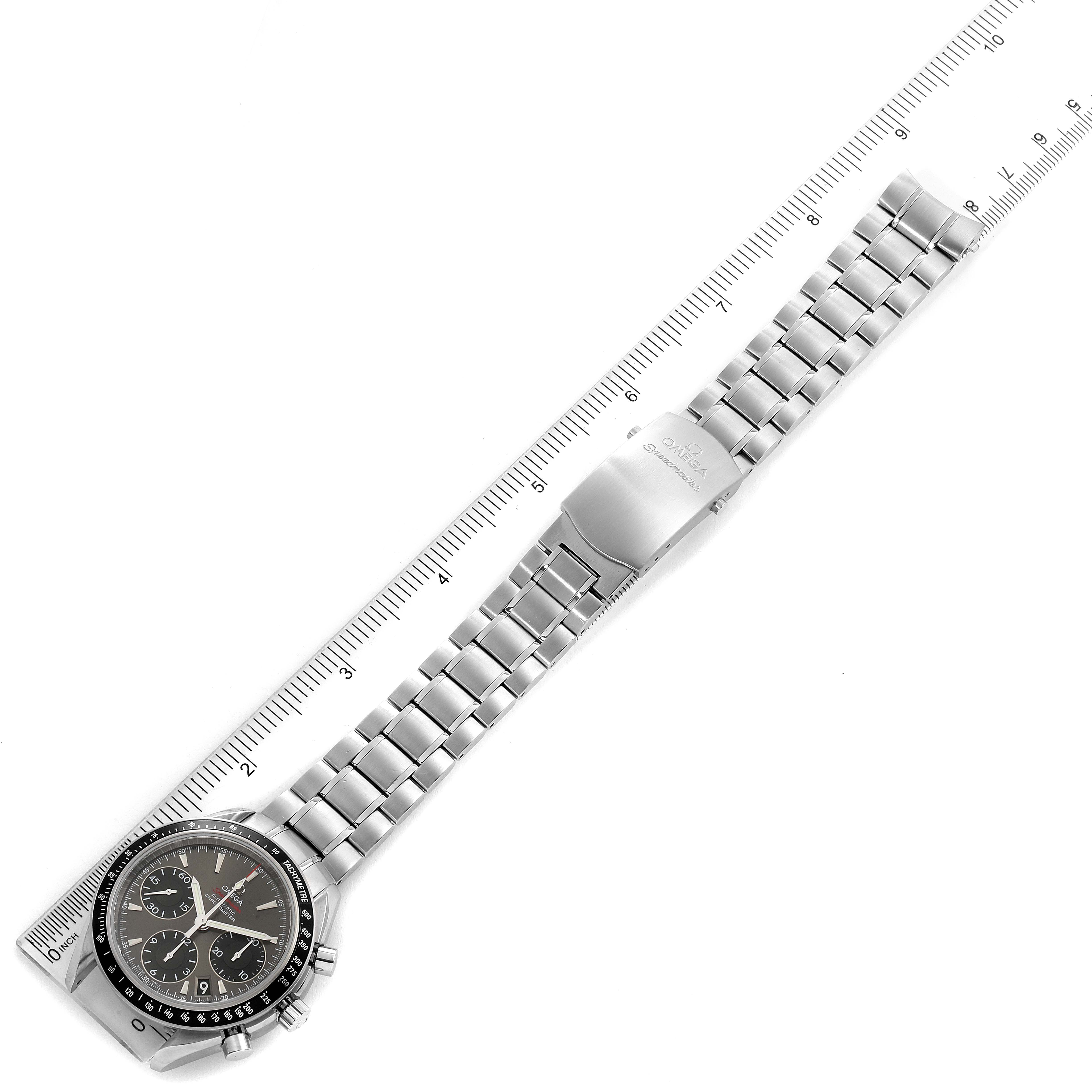 The image shows the Omega Speedmaster 323.30.40.40.06.001 Men's Stainless Steel Grey Dial 323.30.40.40.06.001 Men's Stainless Steel Grey Dial watch laid flat, displaying the bracelet, clasp, and dial face from a top-down angle.