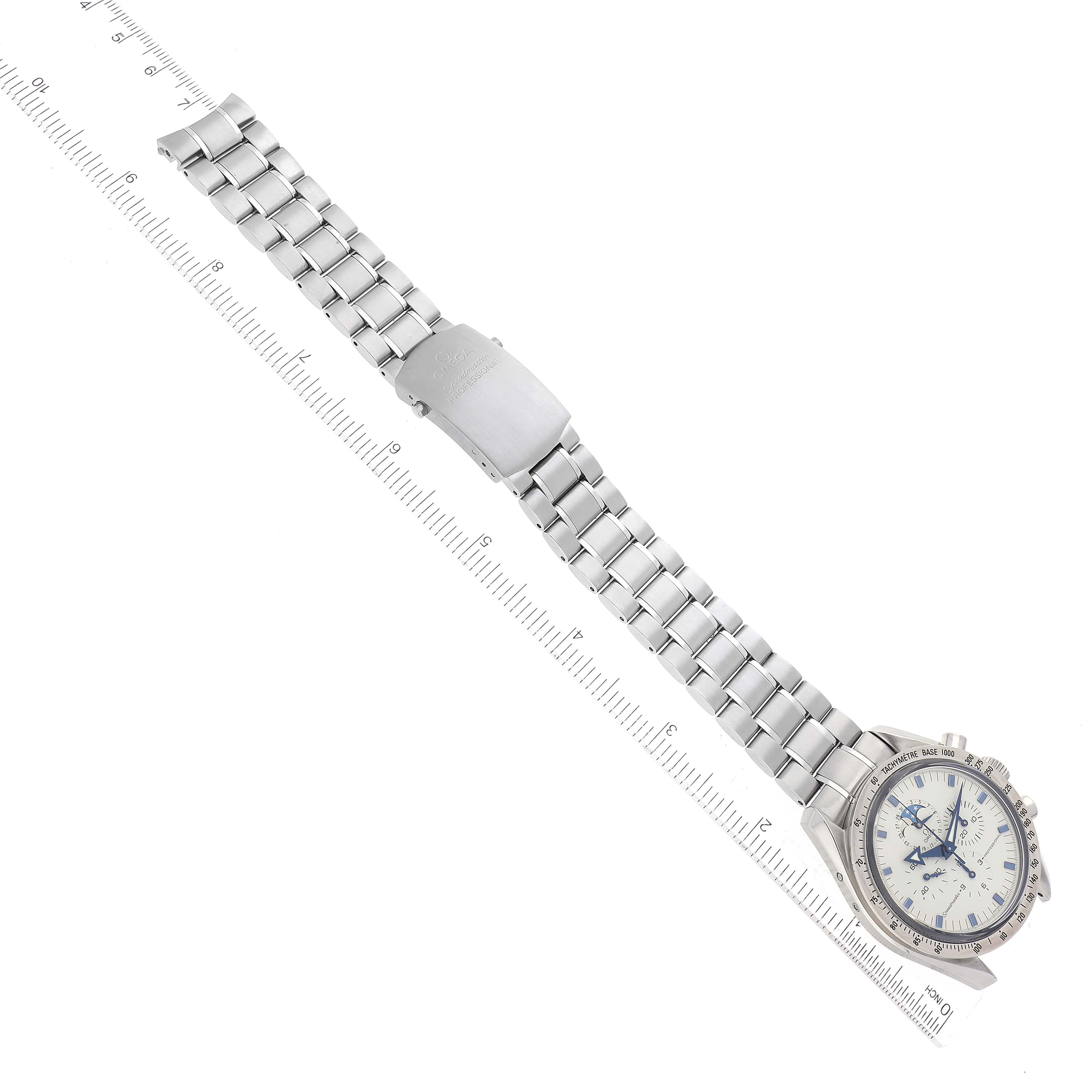 The Omega Speedmaster 3575.20.00 Men's Stainless Steel White Dial 3575.20.00 Men's Stainless Steel White Dial watch is shown from a top-down angle, showcasing the face, bezel, and metal bracelet with clasp.