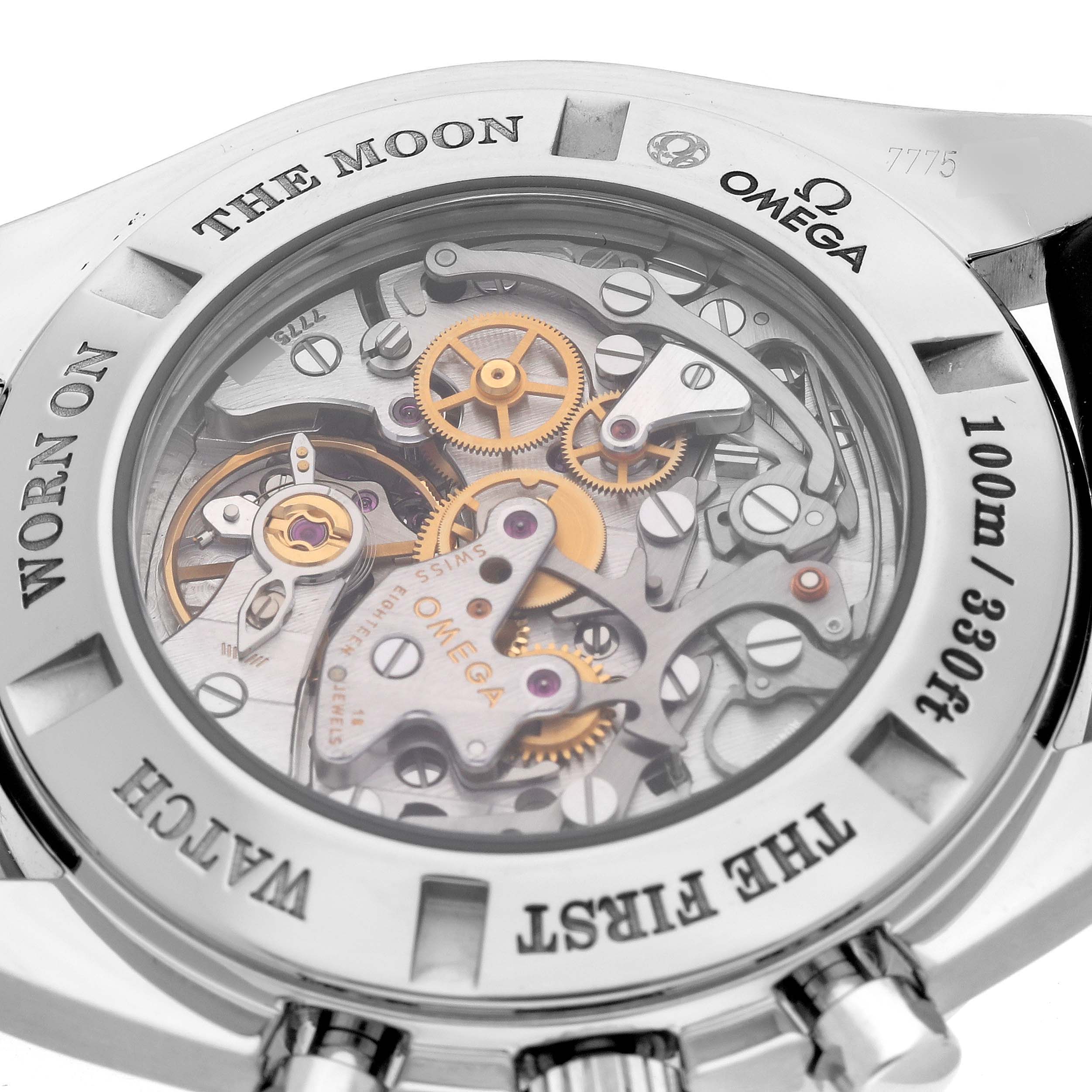 The image shows the case back of an Omega Speedmaster 311.33.44.32.01.001 Men's Stainless Steel Black Dial 311.33.44.32.01.001 Men's Stainless Steel Black Dial, displaying its intricate movement and engraved details.