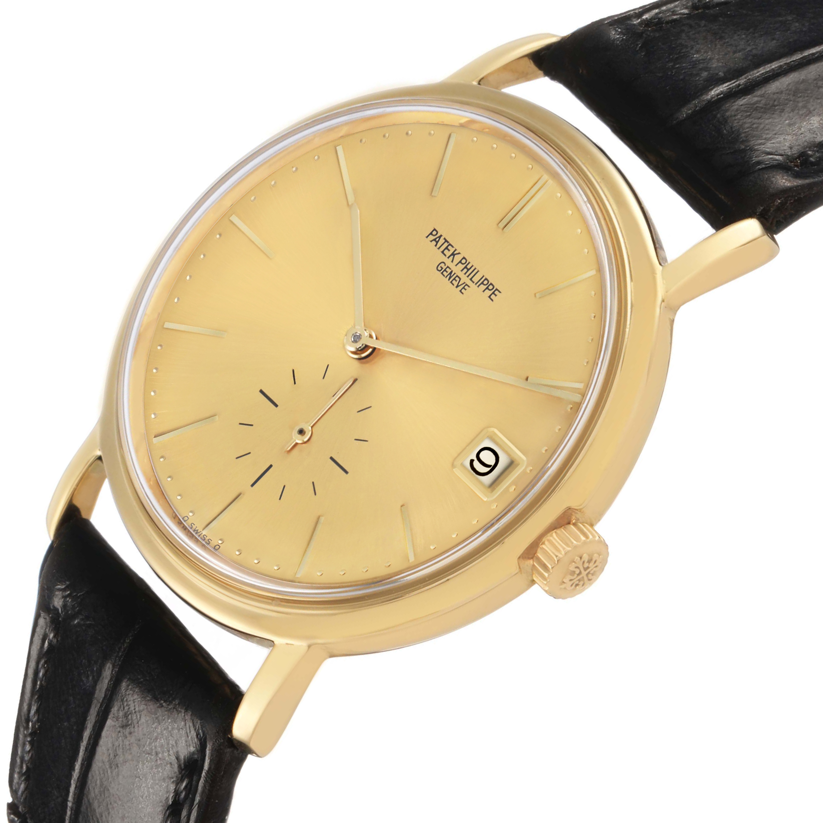 The Patek Philippe Calatrava 3445 Men's Yellow Gold Champagne Dial watch is shown at an angle displaying its gold dial, hands, date window, and crown.