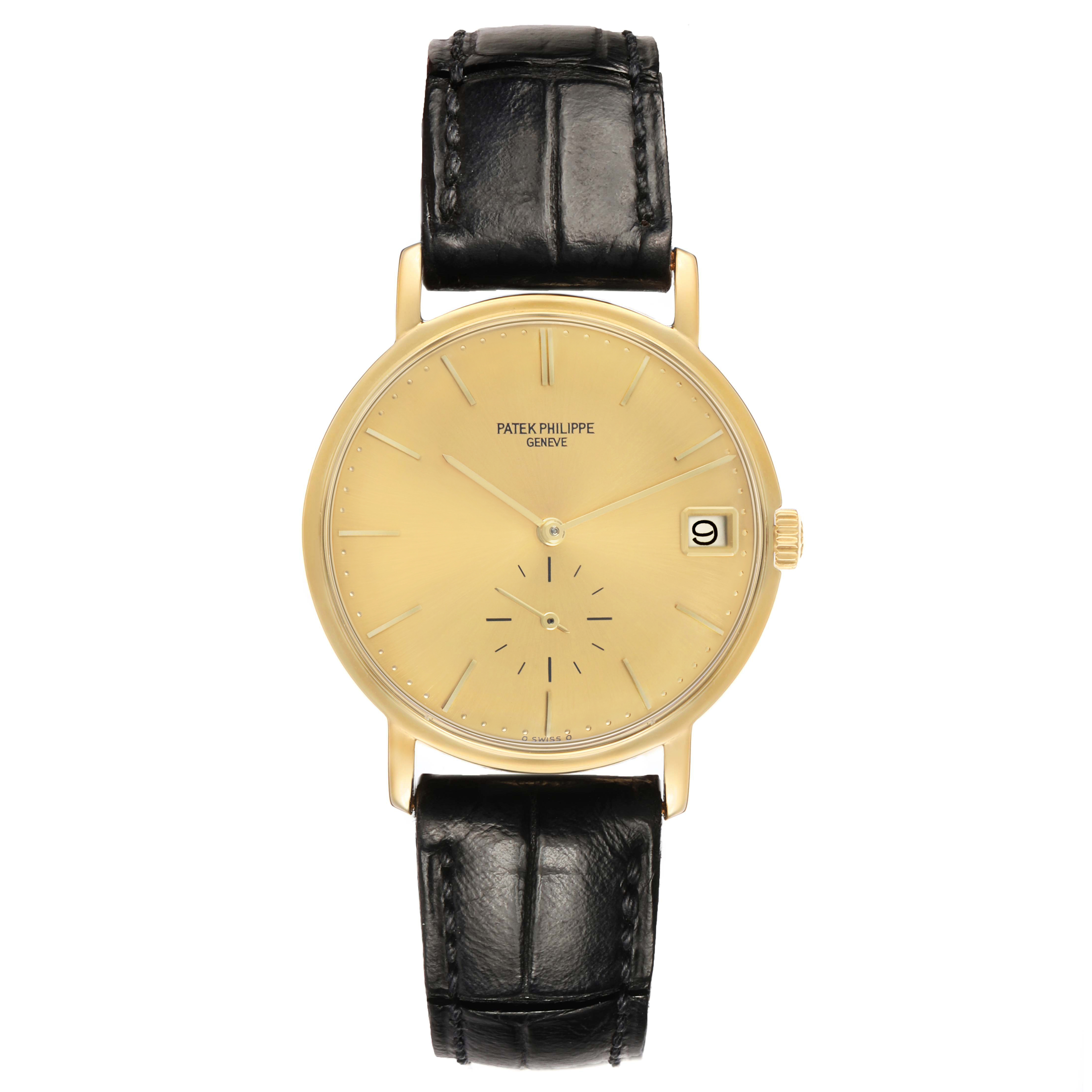 The Patek Philippe Calatrava 3445 Men's Yellow Gold Champagne Dial watch is shown from a front view, highlighting the gold dial, black leather strap, and date display.