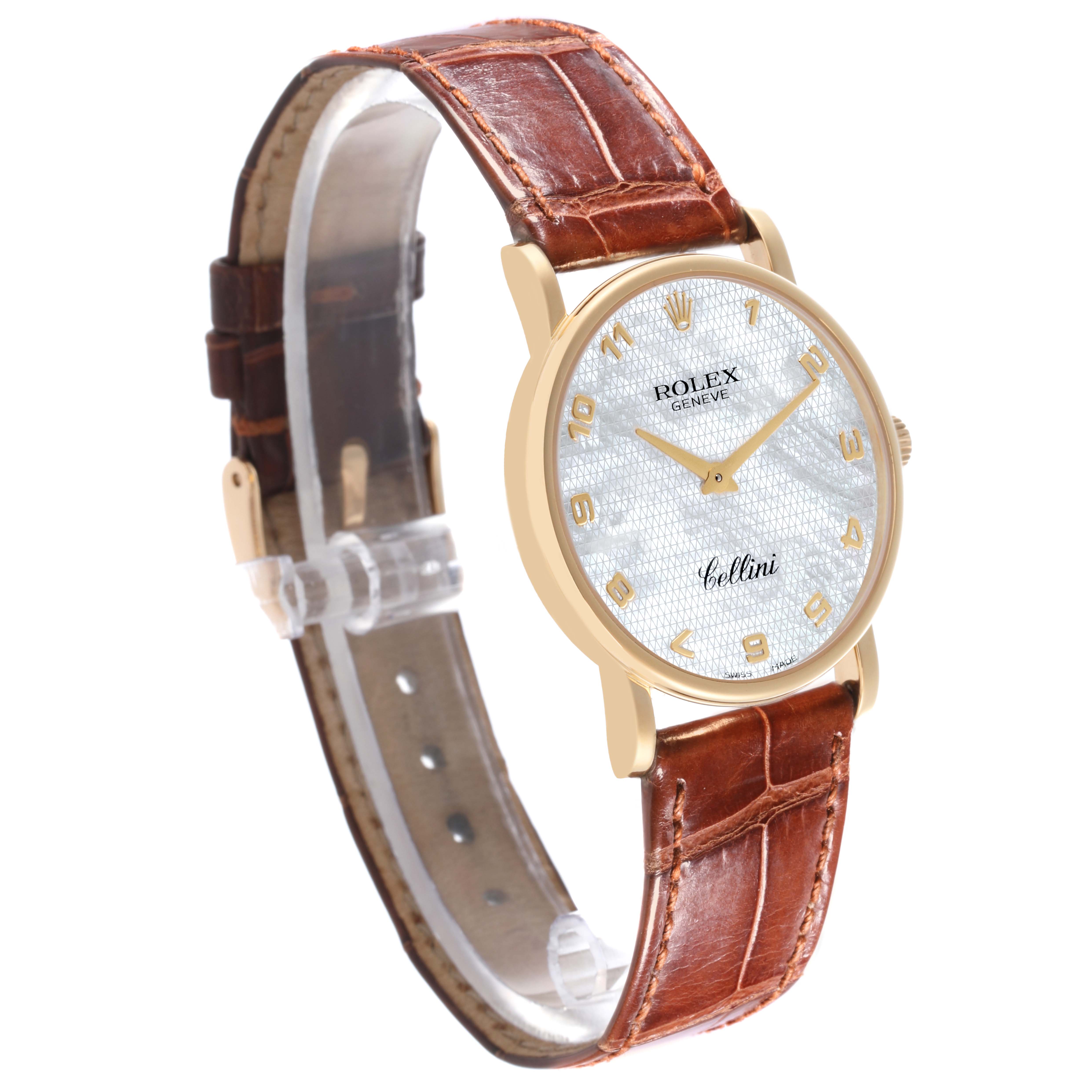 The Rolex Cellini 5115 Men's Yellow Gold Mother of Pearl Dial 5115 Men's Yellow Gold Mother of Pearl Dial watch is shown at a slight angle, highlighting its dial, gold case, and brown leather strap.