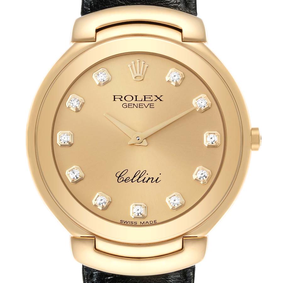 The Rolex Cellini watch is shown from a top-down angle, highlighting its gold-toned face, crystal markers, and crown.