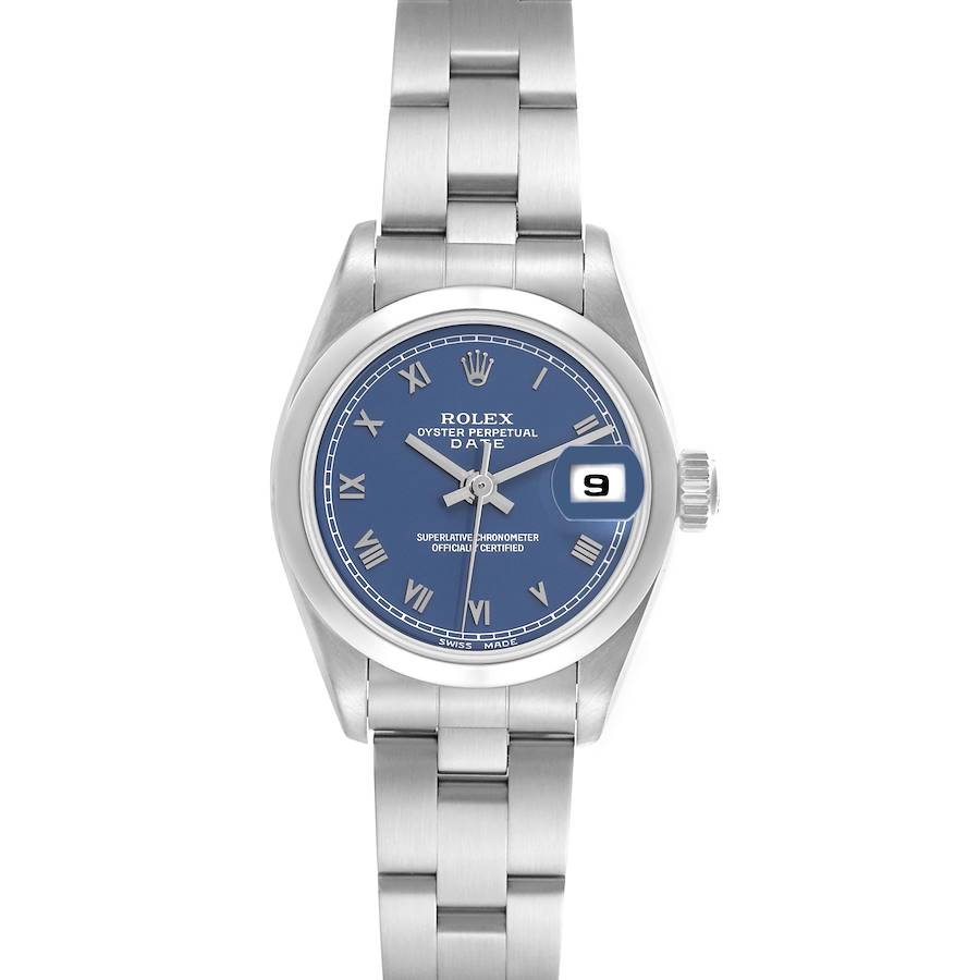 The Rolex Date model watch is shown from a top-down angle, displaying the blue dial, hands, bracelet, and date magnifier.