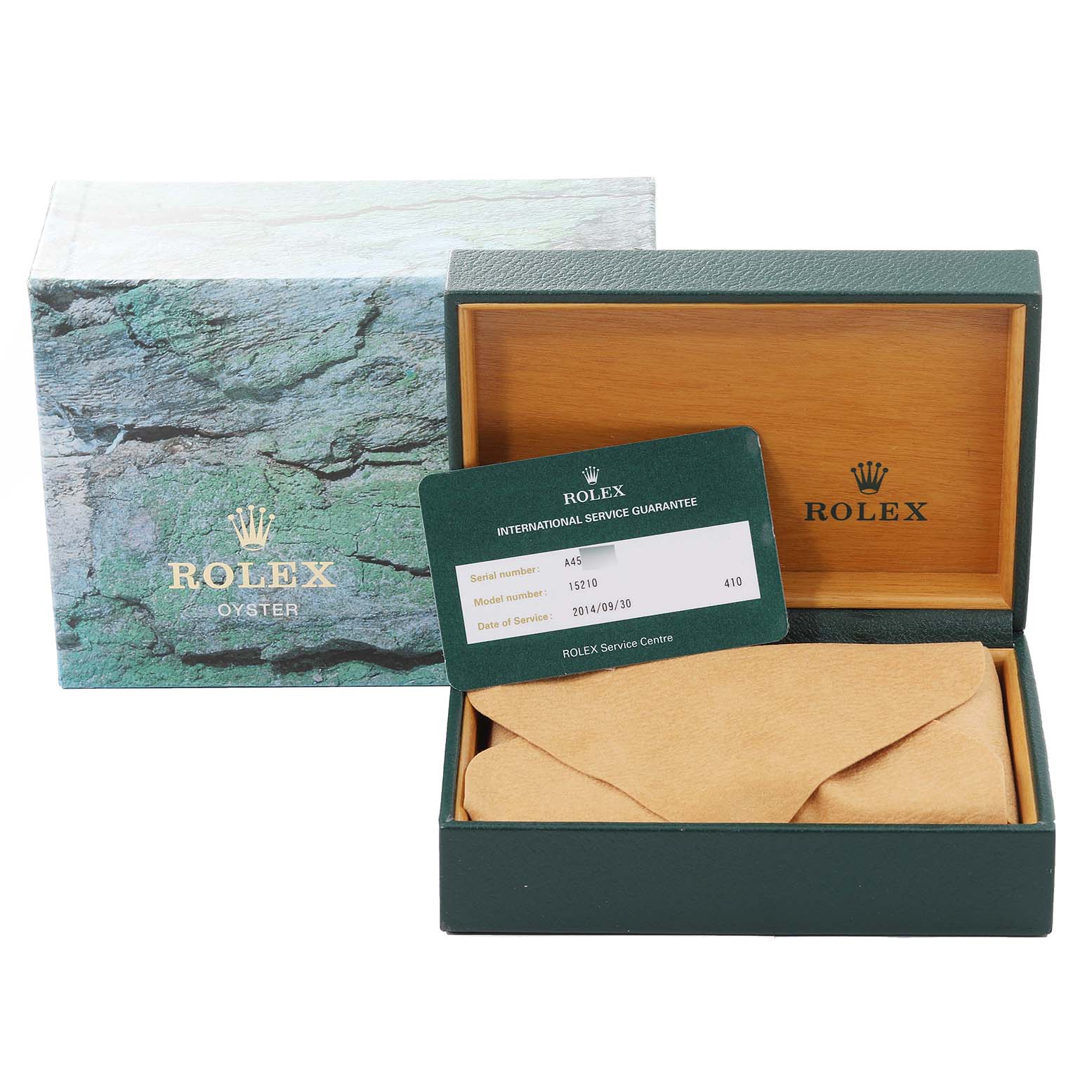 The image shows a Rolex Date 15210 Men
s Stainless Steel Silver Dial 15210 Men
s Stainless Steel Silver Dial model
s packaging, including the box, a warranty card, and a wrapped item, likely the watch.