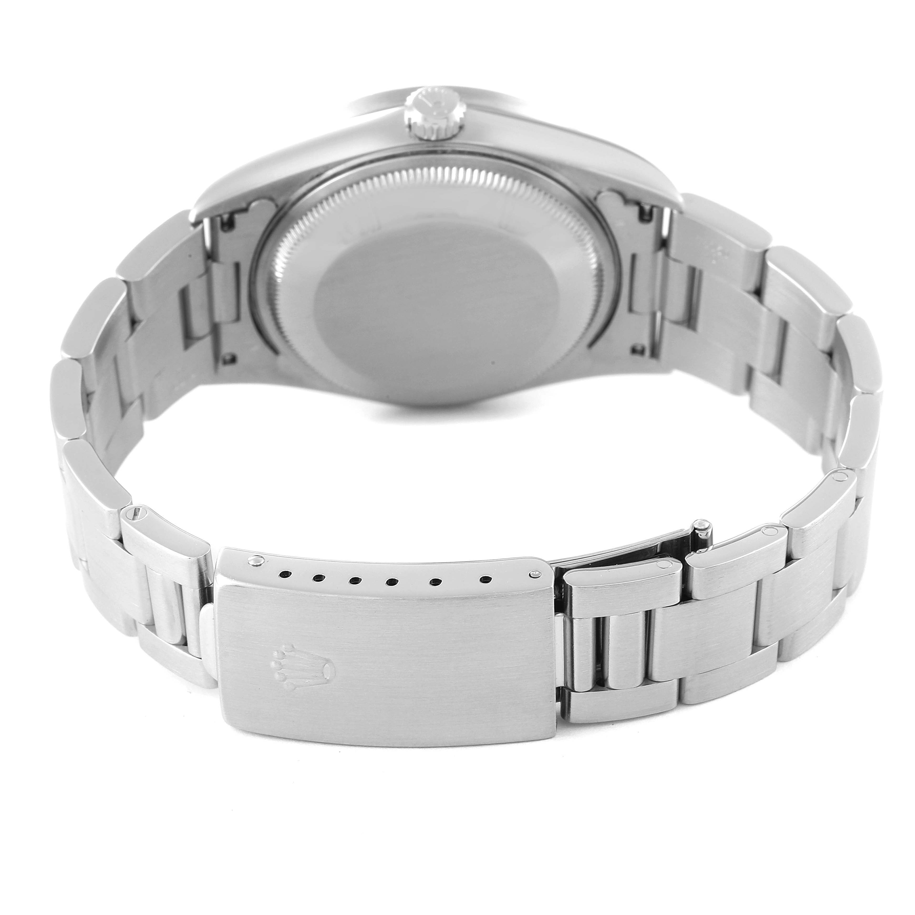 The image shows the backside and bracelet clasp of a Rolex Date 15210 Men
s Stainless Steel Silver Dial 15210 Men
s Stainless Steel Silver Dial model watch.