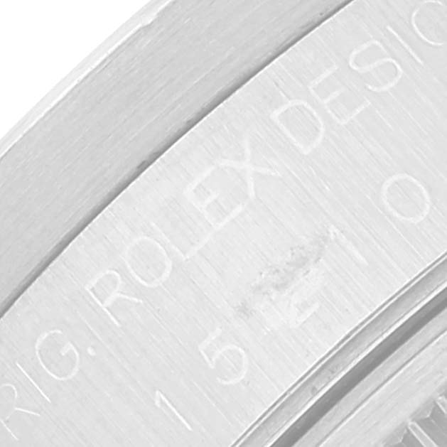 This image shows a close-up of the side engraving on the Rolex Date 15210 Men
s Stainless Steel Silver Dial 15210 Men
s Stainless Steel Silver Dial model watch.