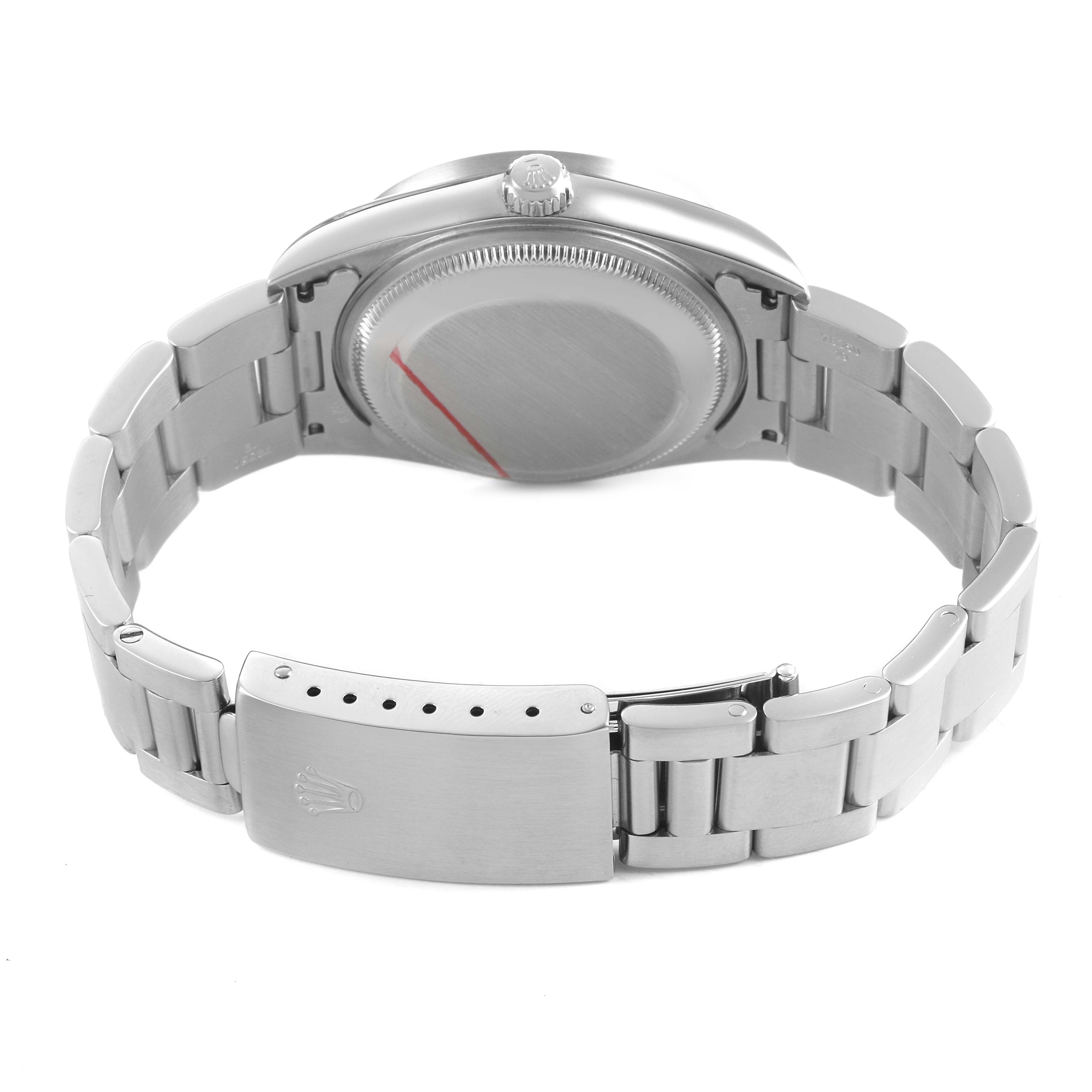 The image shows the back of a Rolex Date 15210 Men's Stainless Steel Blue Dial watch, highlighting the case back, crown, and bracelet with the clasp visible.