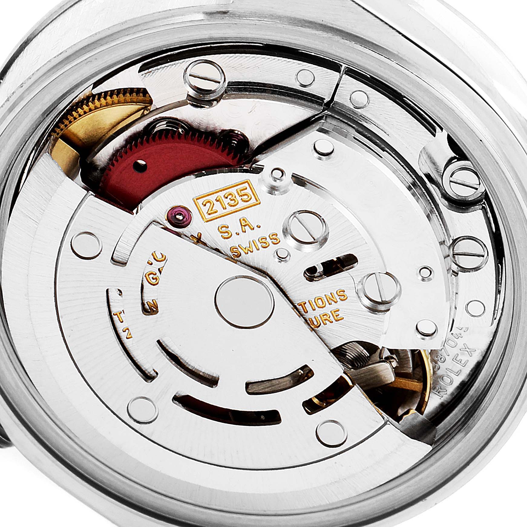 This image shows a close-up of the movement mechanism of a Rolex Datejust 69174 Women's Stainless Steel Pink Dial 69174 Women's Stainless Steel Pink Dial watch.