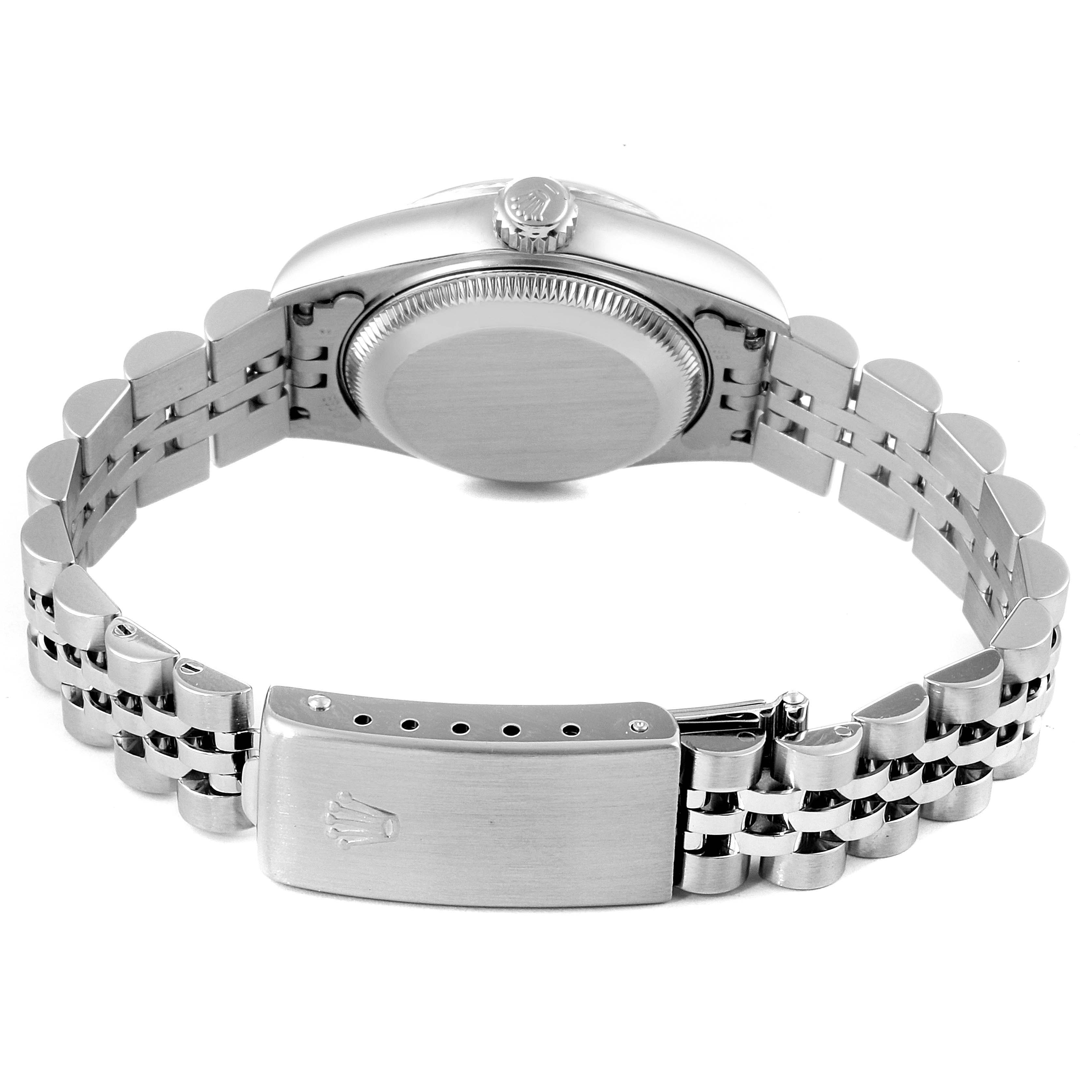 This image shows the back case, crown, and bracelet of a Rolex Datejust 69174 Women's Stainless Steel Pink Dial 69174 Women's Stainless Steel Pink Dial watch from a rear view angle.