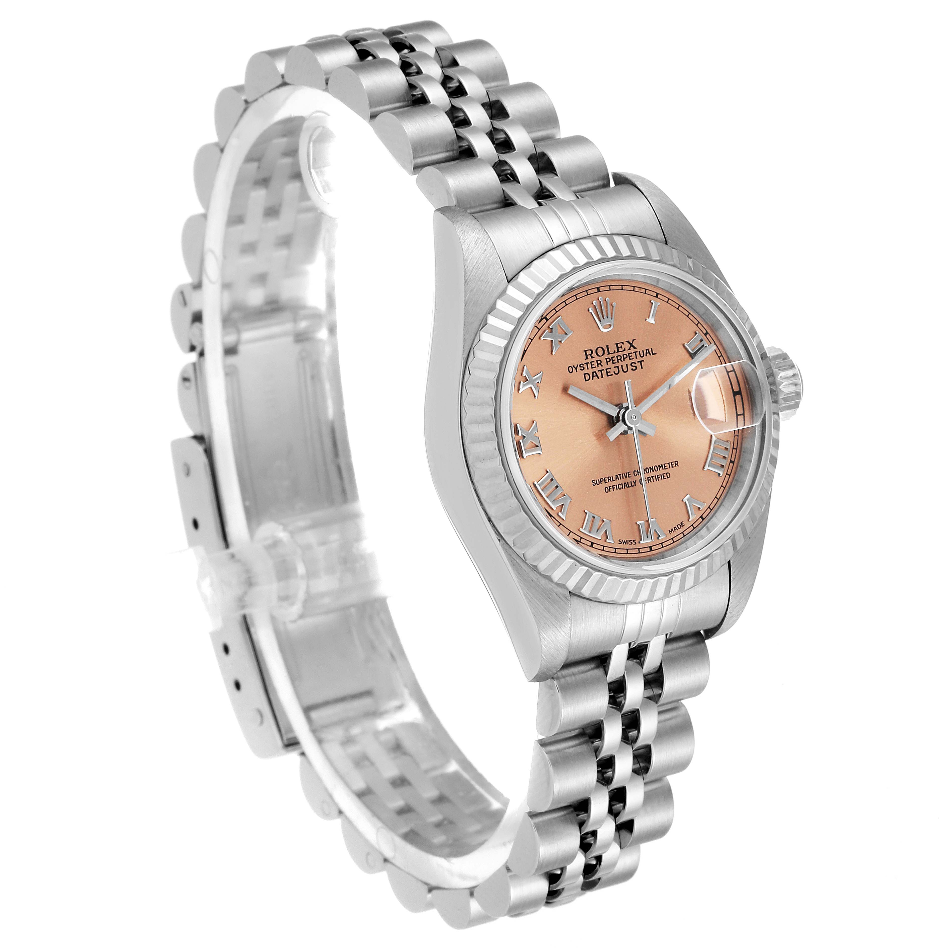 This Rolex Datejust 69174 Women's Stainless Steel Pink Dial 69174 Women's Stainless Steel Pink Dial model is pictured at an angle showing the dial, bracelet, bezel, and crown.