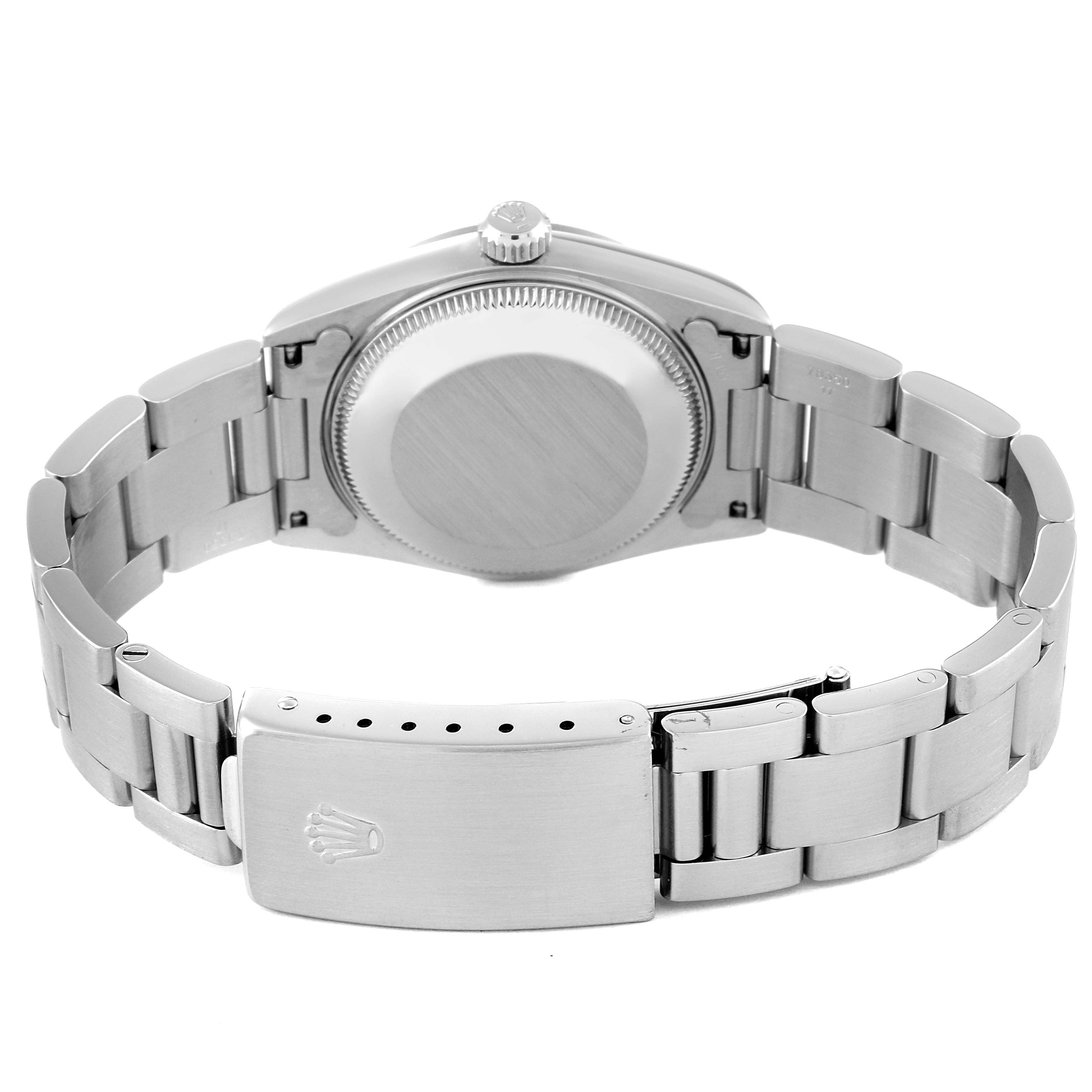 This image shows the back case and bracelet clasp of the Mid-Size Rolex watch.