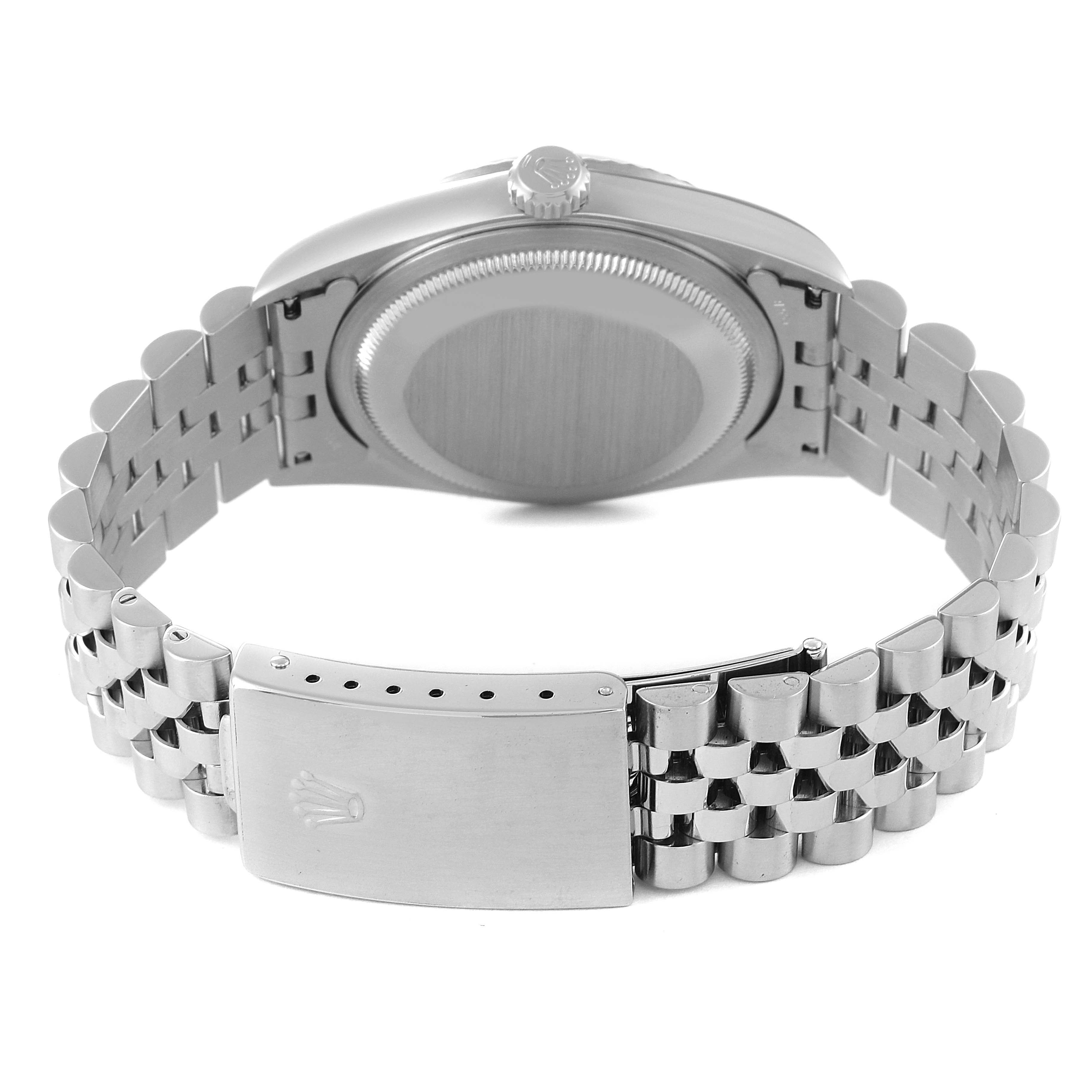 This image shows the back view of a Rolex Datejust 16234 Men's Stainless Steel Silver Dial 16234 Men's Stainless Steel Silver Dial model, featuring the case back and bracelet with the clasp open.