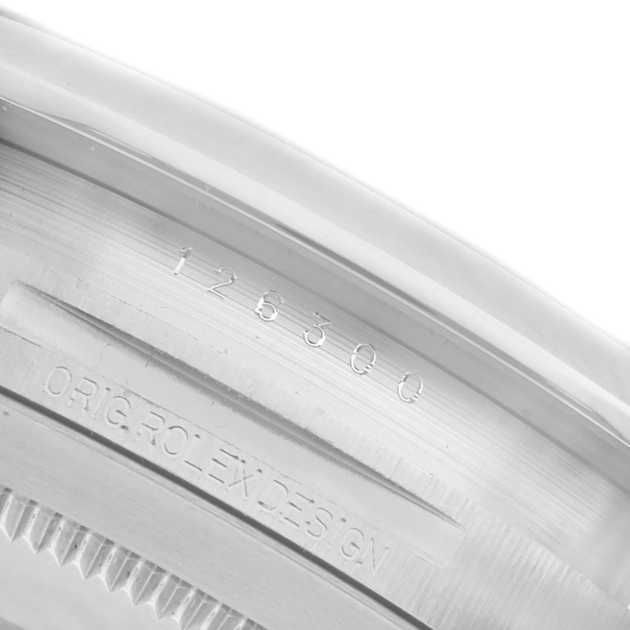 This image shows the inner bezel of the Rolex Datejust 41 126300 Men's Stainless Steel Blue Dial 126300 Men's Stainless Steel Blue Dial, featuring engraving details like "ORIG ROLEX DESIGN" and the model number.