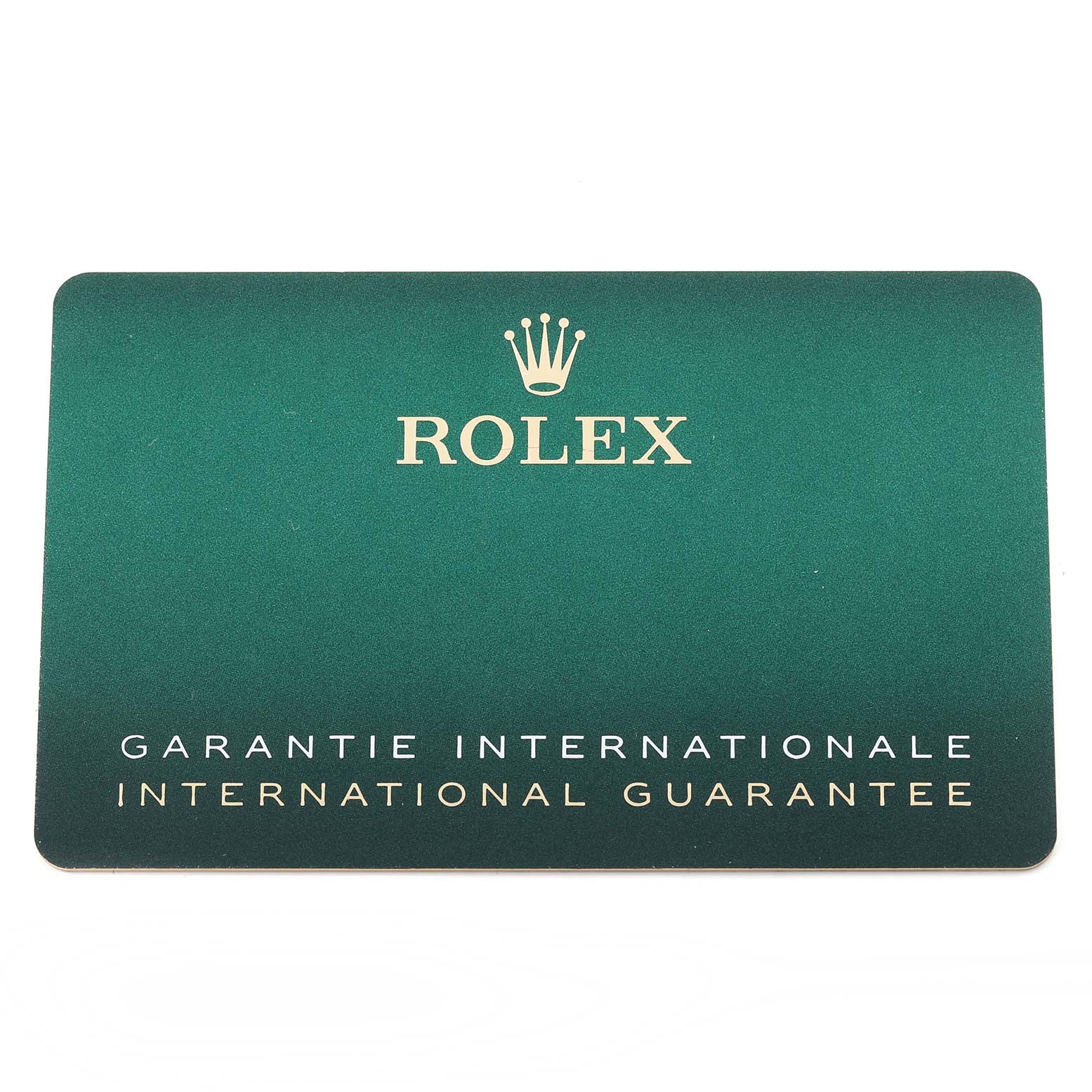 The image shows the international guarantee card for a Rolex Datejust 41 126300 Men's Stainless Steel Blue Dial 126300 Men's Stainless Steel Blue Dial, featuring the brand logo and text.