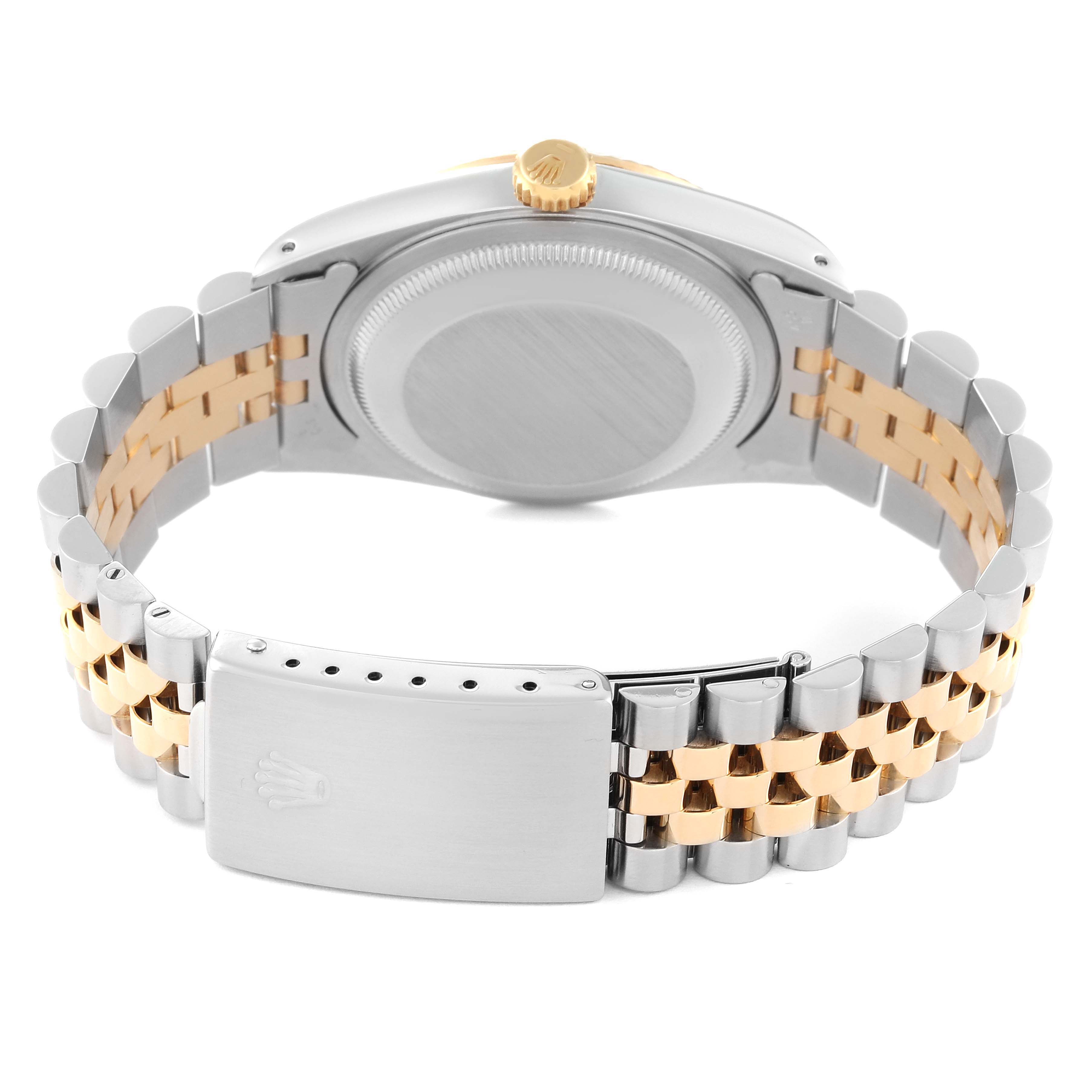 This image shows the back view of the Rolex Datejust 16233 Men's Steel and Gold (two tone) Champagne Dial 16233 Men's Steel and Gold (two tone) Champagne Dial watch, highlighting its case, crown, and two-tone jubilee bracelet with clasp.