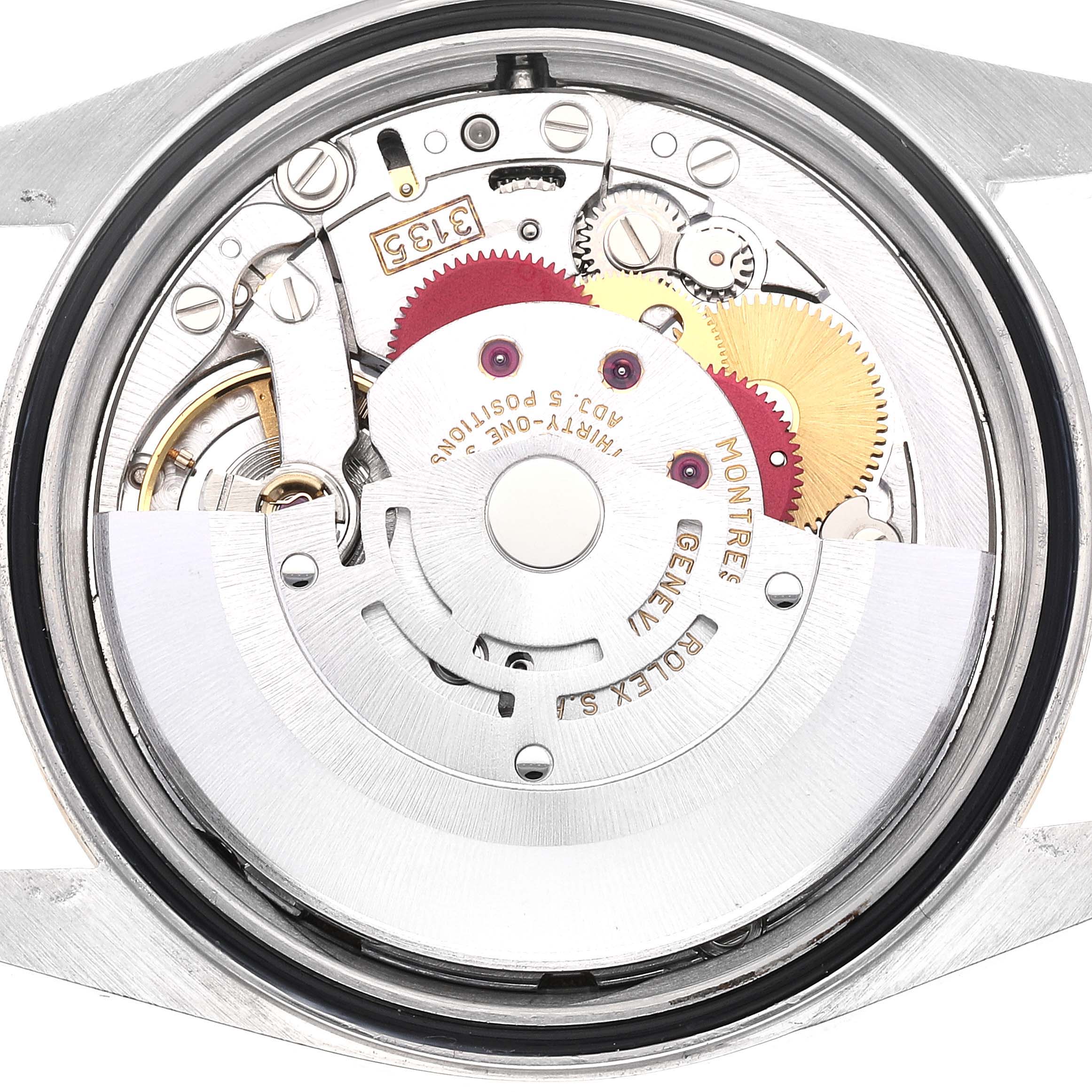 This image shows the intricate internal movement mechanism of the Rolex Datejust 16233 Men's Steel and Gold (two tone) Champagne Dial 16233 Men's Steel and Gold (two tone) Champagne Dial watch viewed from the back.